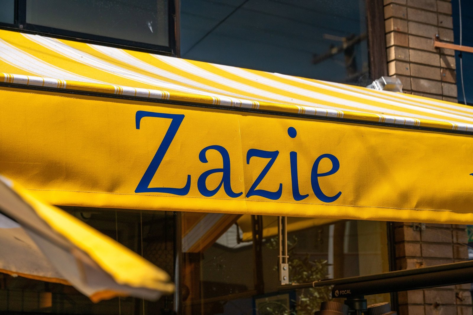 Yellow Zazie awning on Cole Street in Cole Valley, San Francisco