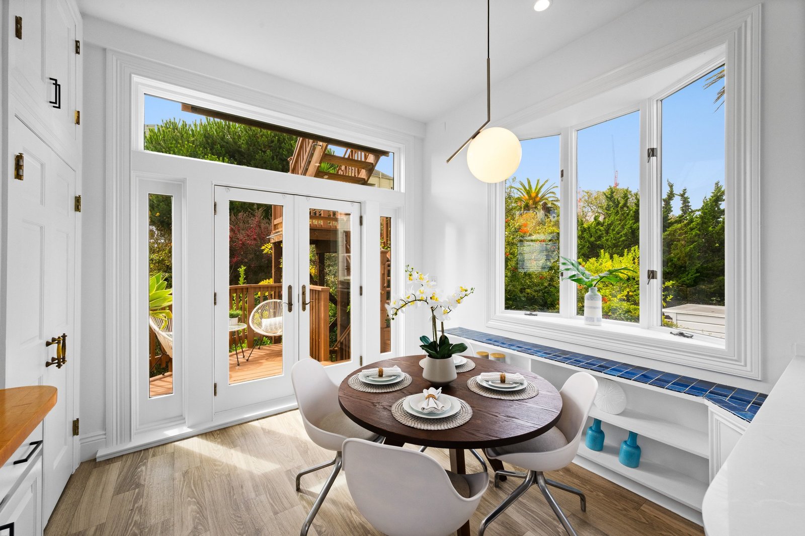 Breakfast area with French doors opening to the south-facing deck at 449 Frederick Street
