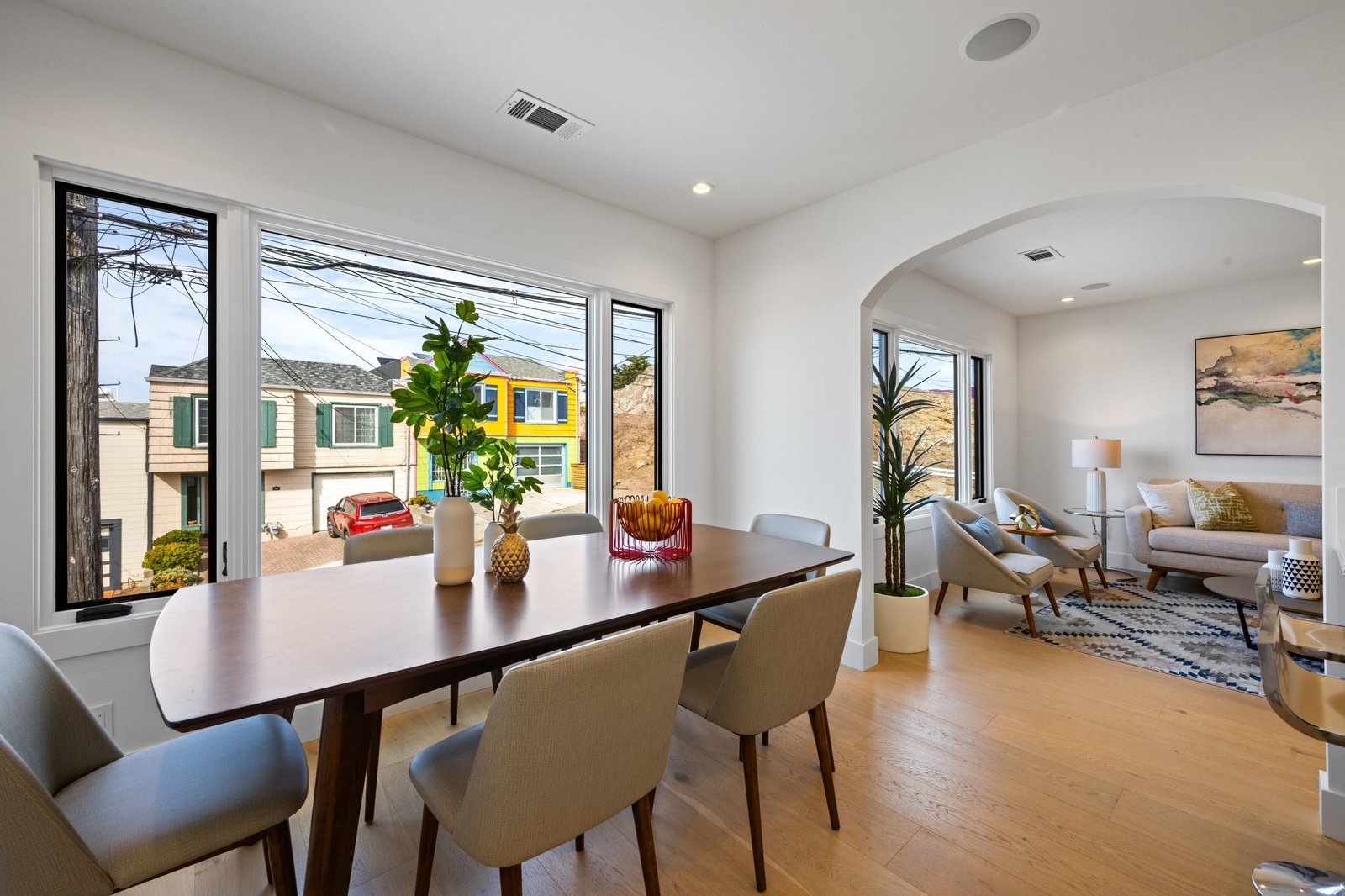 Dining room with a wall of windows at 15 Shields Street, San Francisco