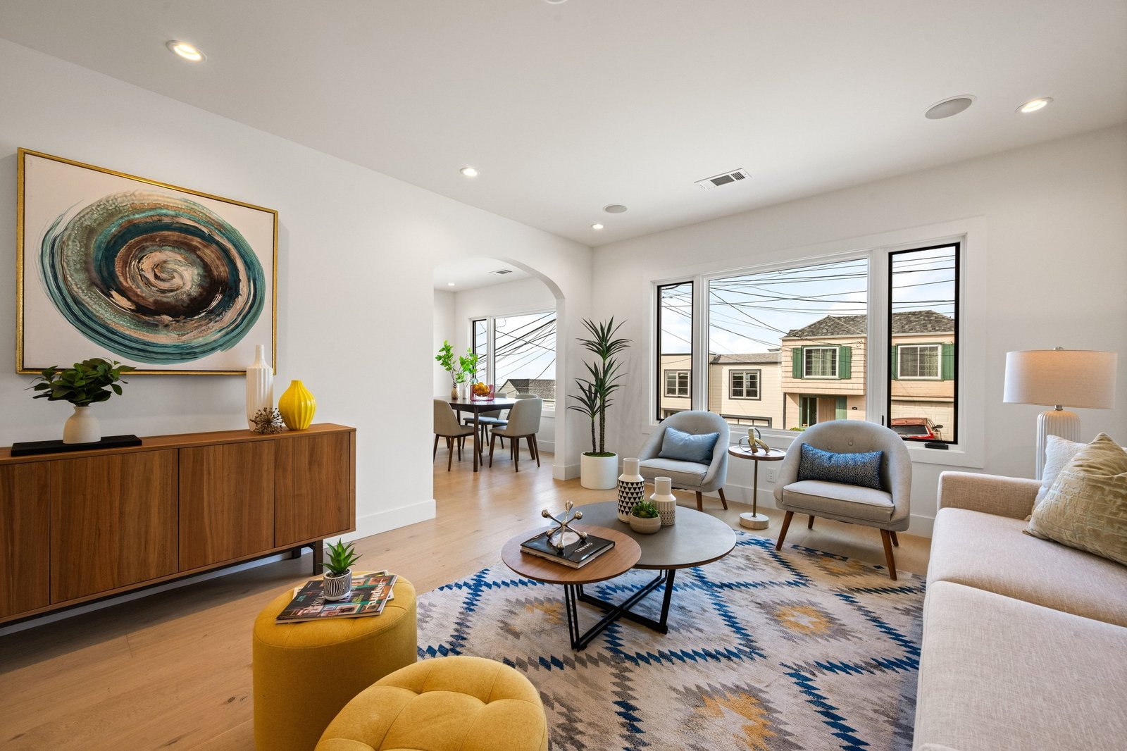 Living room with large front windows at 15 Shields Street, Ingleside Heights