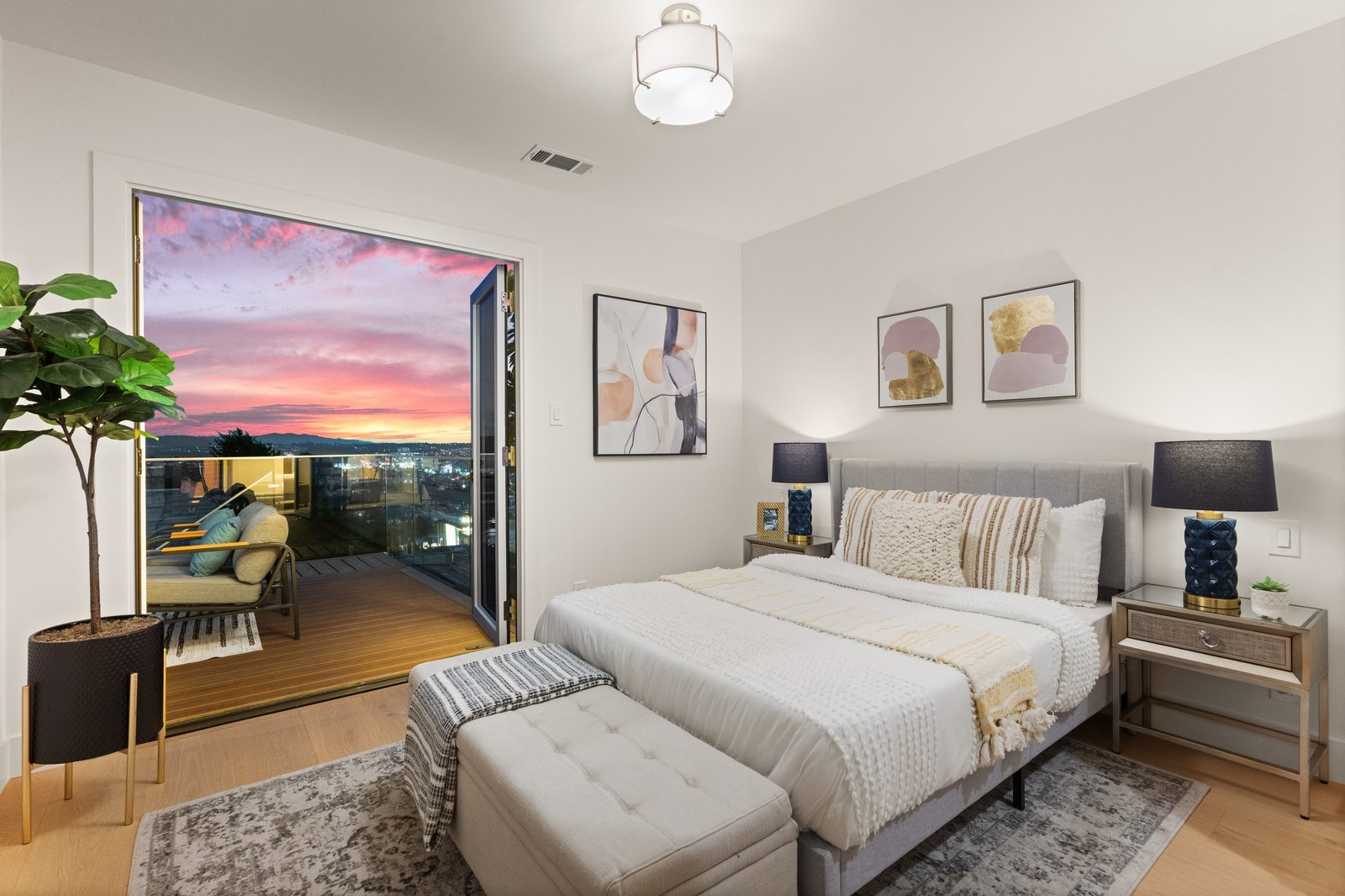 Bedroom with French doors to the rear deck at sunset at 15 Shields Street, San Francisco