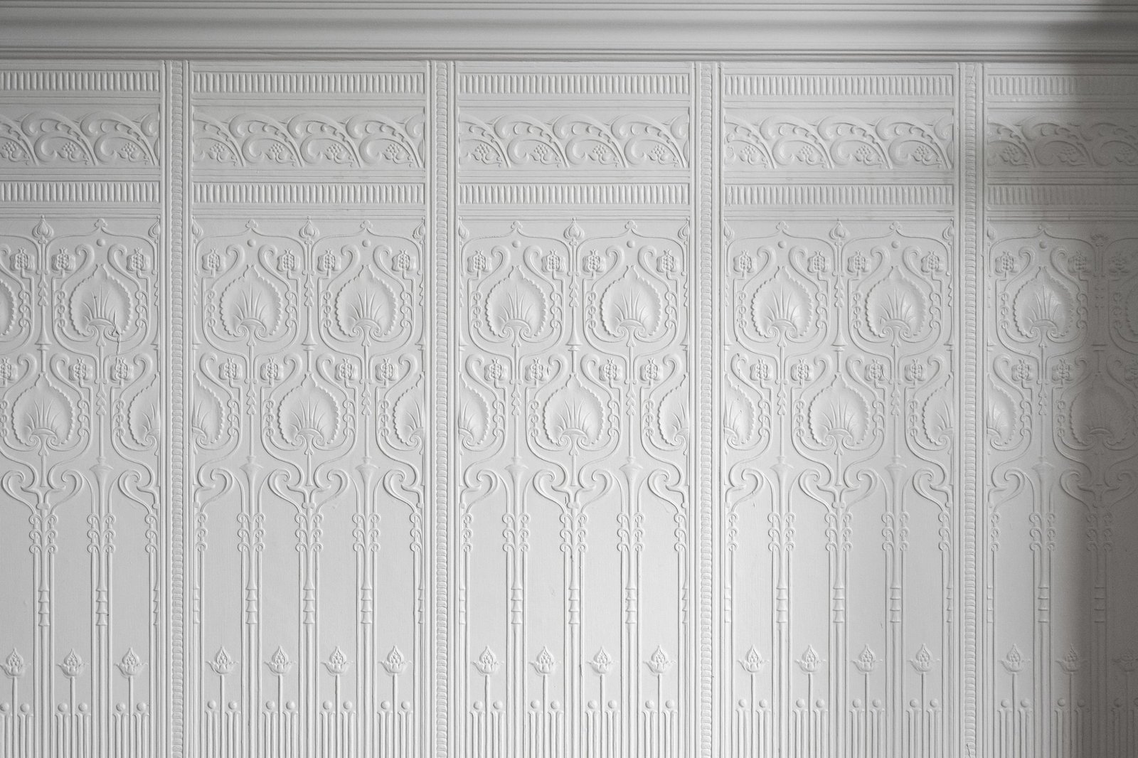 Detail of preserved embossed Victorian wainscoting at 449 Frederick Street, San Francisco