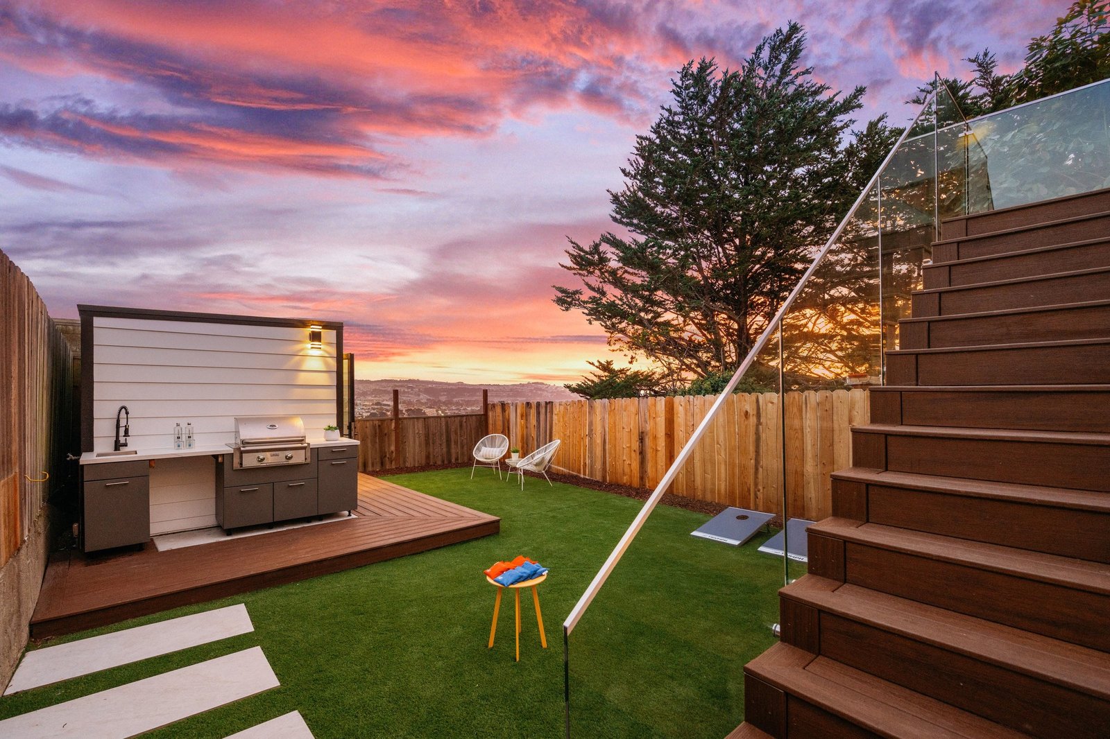 Yard and built-in grill station at twilight at 15 Shields Street, Ingleside Heights