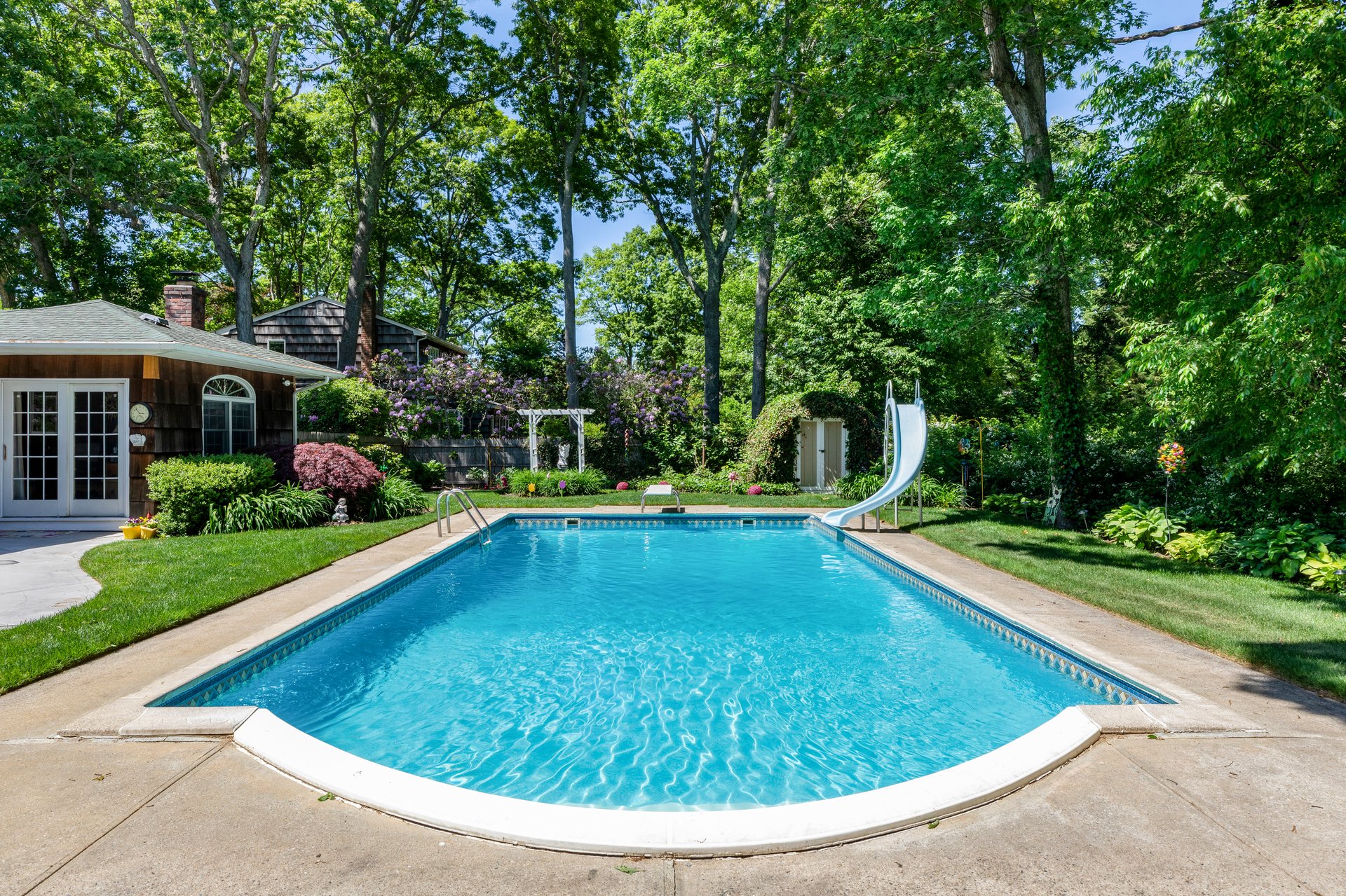 A Quiet Village Setting with a Pool at Its Center