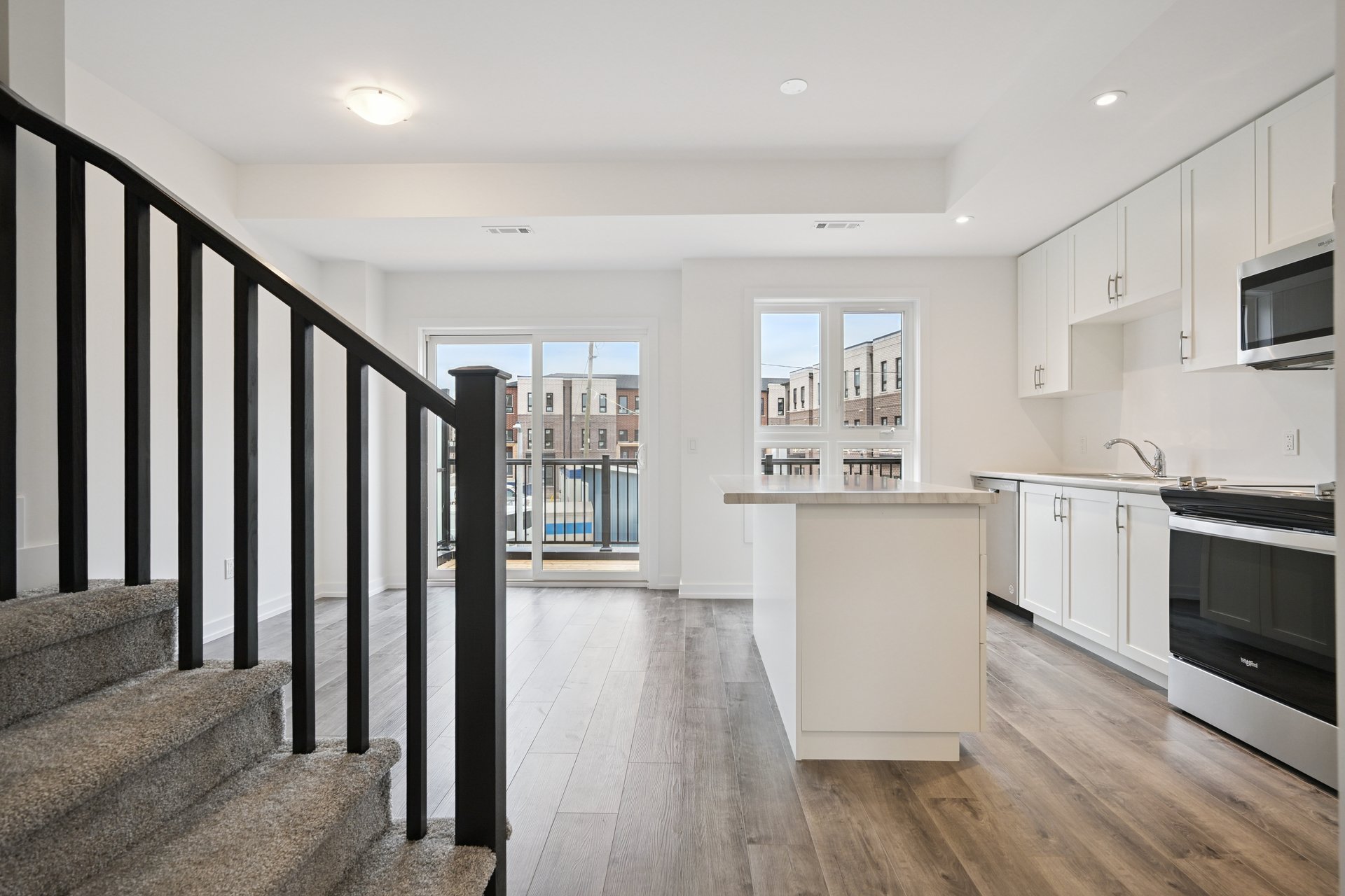 Brand-new, never-lived-in stacked townhome
