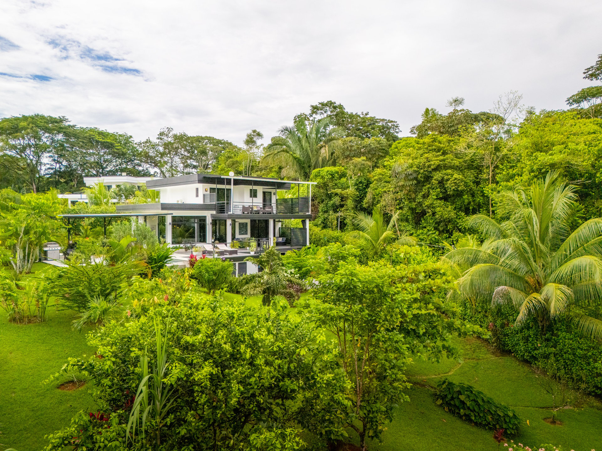 Modern 4-Bedroom Family Sanctuary with Infinity Pool, Edible Forest Garden - Exclusive Gated Ojochal Community 
