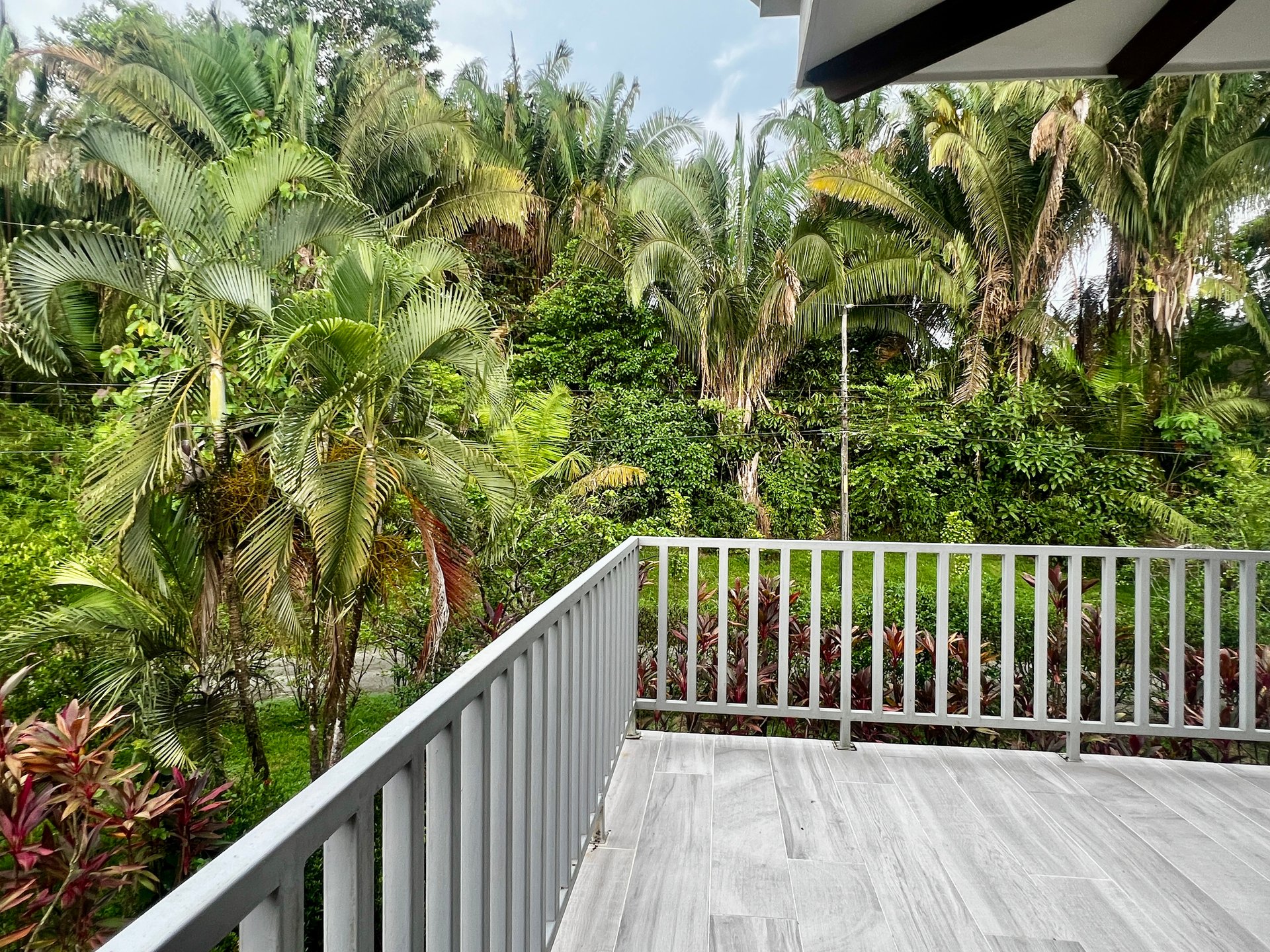 Remodeled Beach-Style Villa with Lush Jungle Setting