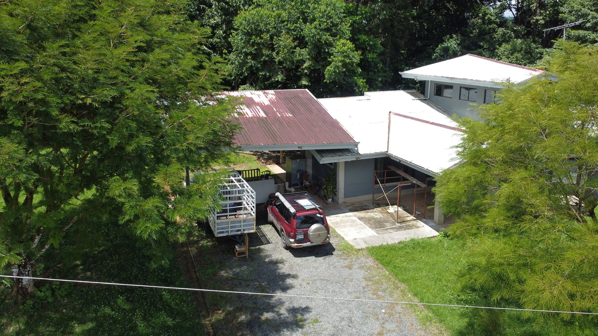 Fixer-Upper Home with an studio Office in Palmar Norte on a 7.58 Acres Property