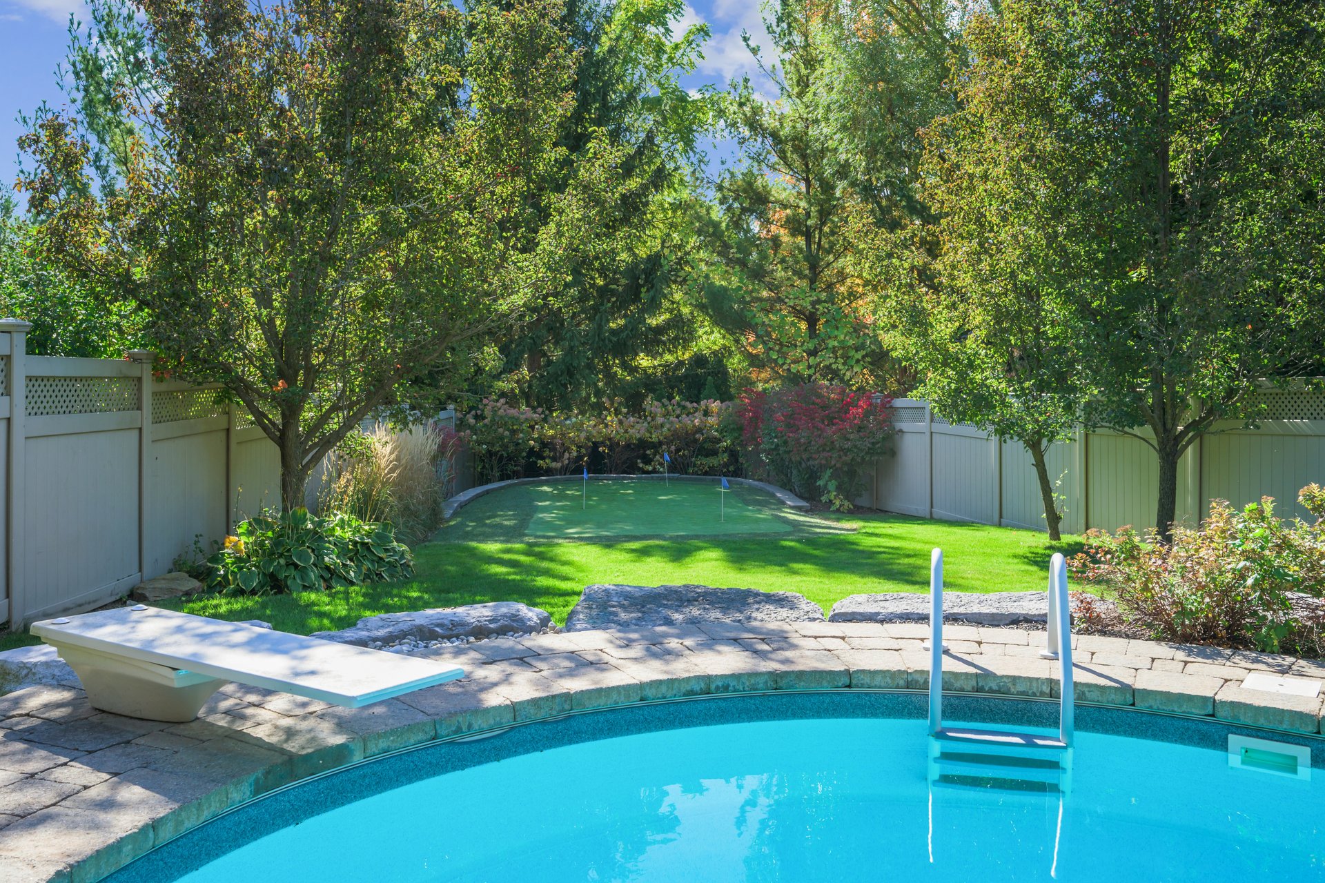 Resort-style yard backing onto lush ravine