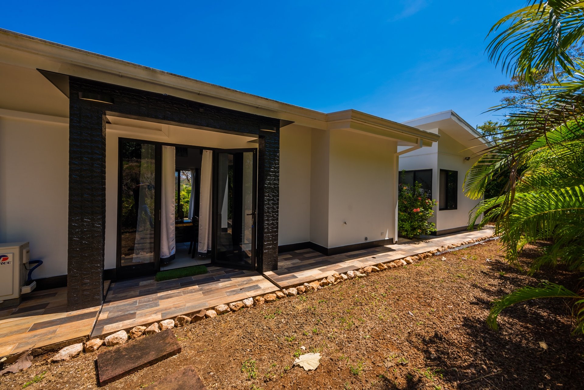 Villa Eva | Exclusive Gated Community Home with Mountain Views Near Tamarindo Beach