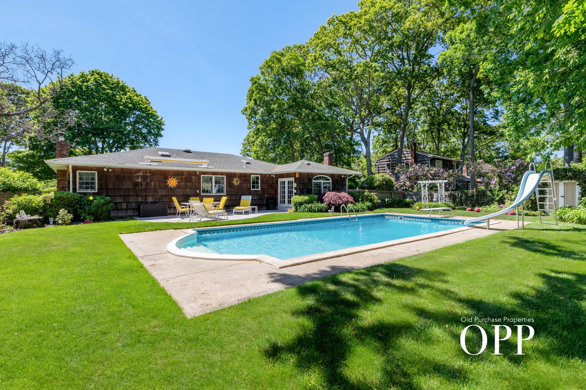 A Quiet Village Setting with a Pool at Its Center
