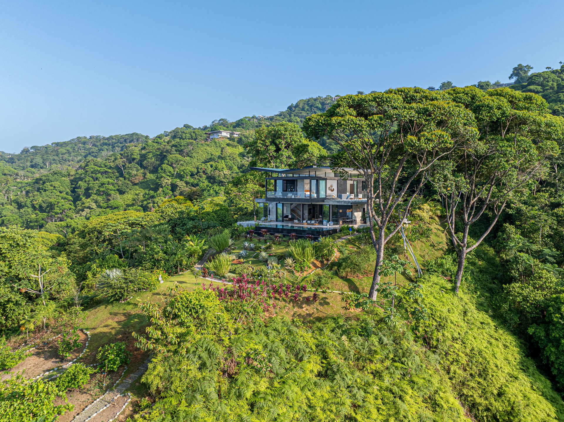 Architectural Masterpiece with Panoramic Whale Tail & Year-Round Sunset Views