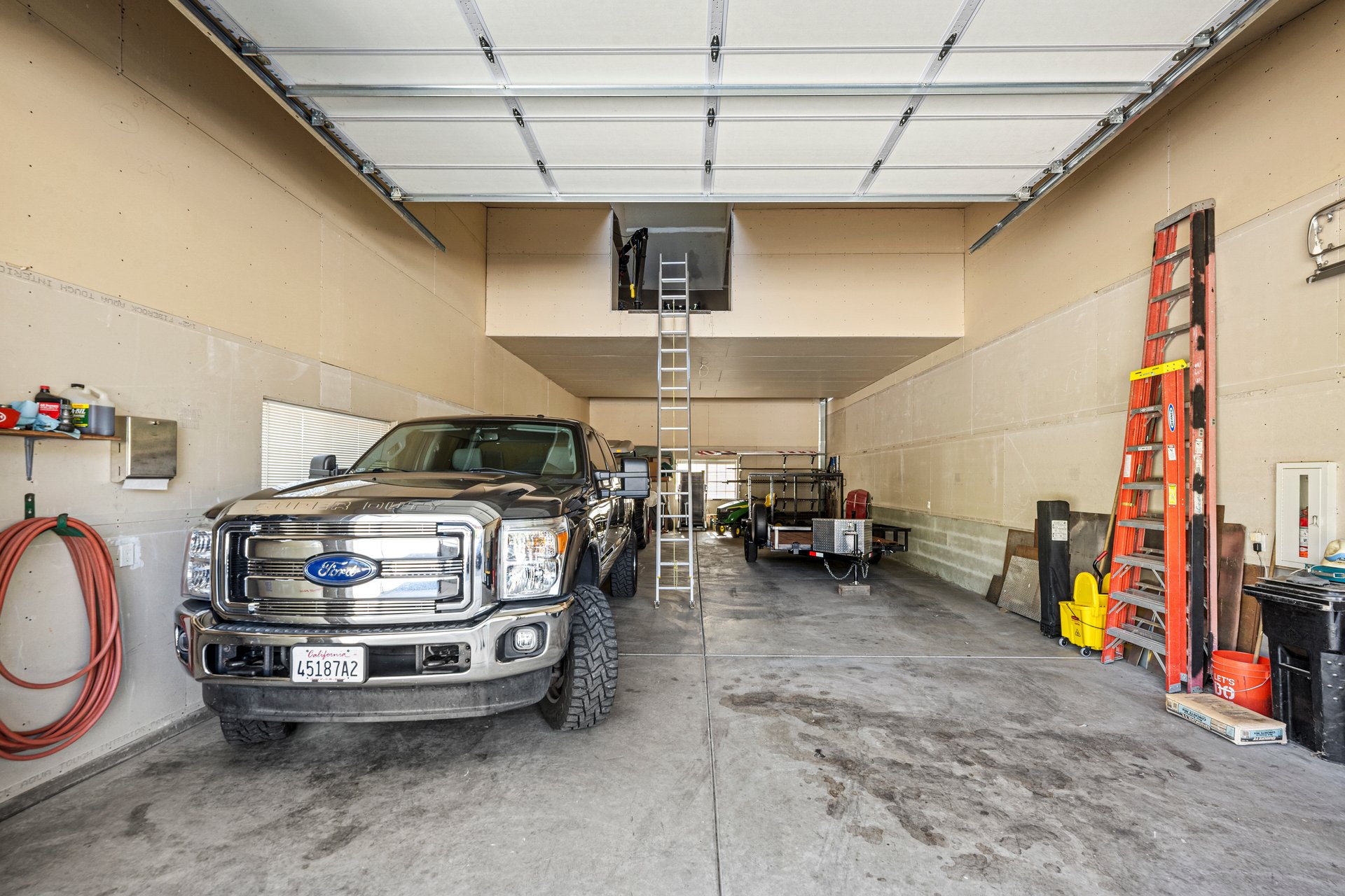 Custom Built Home on 4 Flat Acres in the Heart of Pleasant Valley – A Car Enthusiast's Dream!