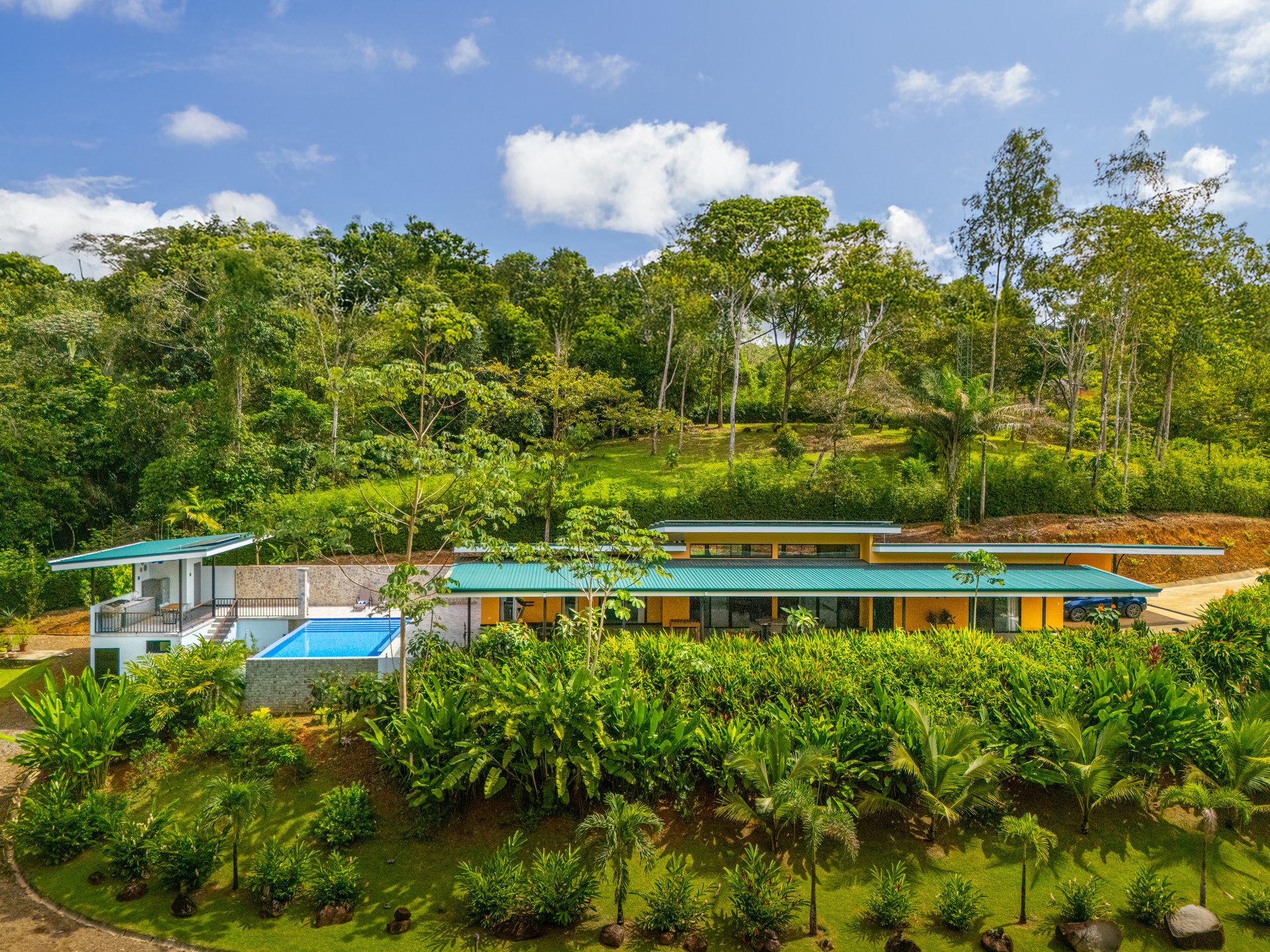 Tropical Family Compound | Luxury Home, 2 Villas, River & Cascades - 2.3 Acres