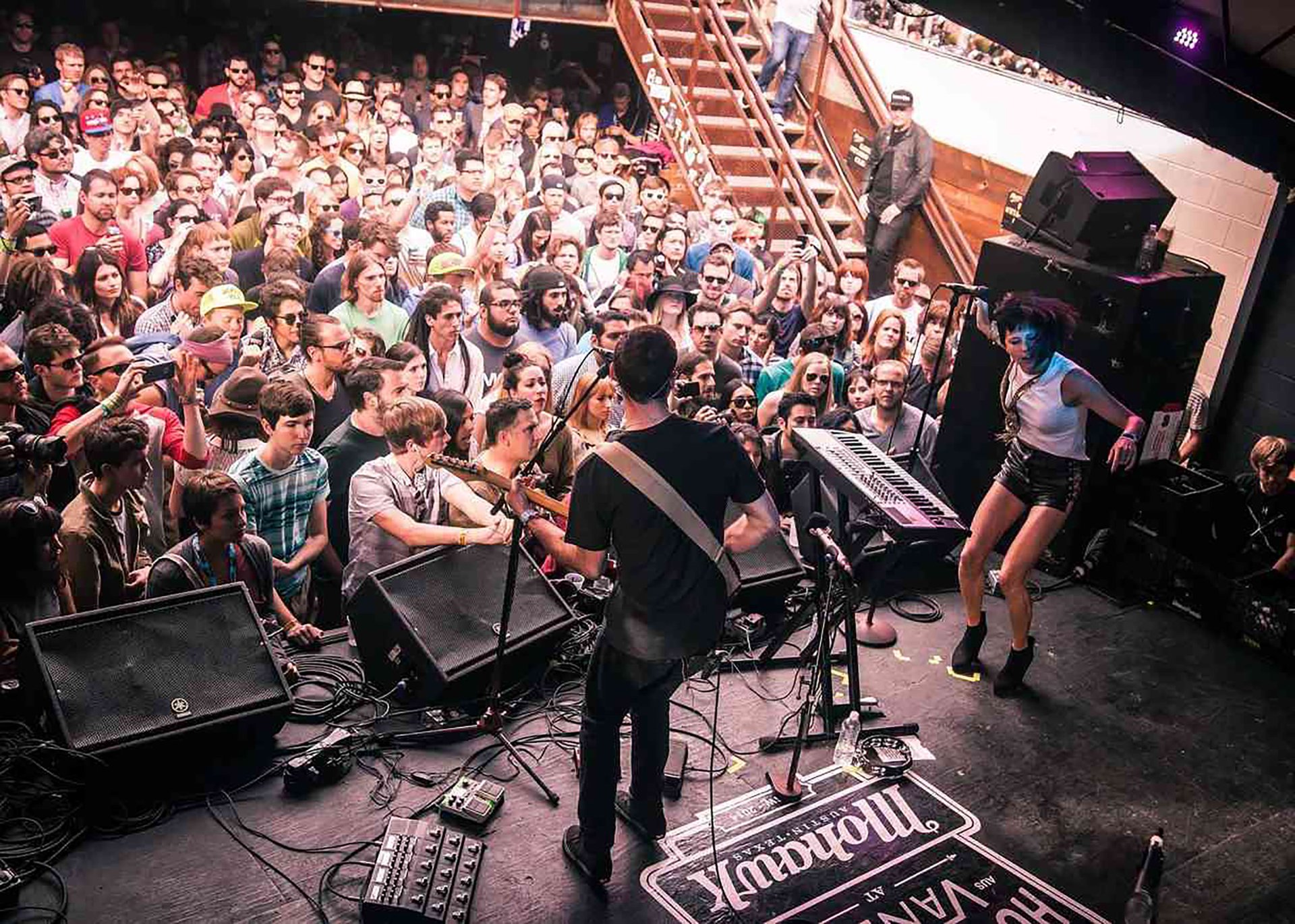 People toasting with wine glasses