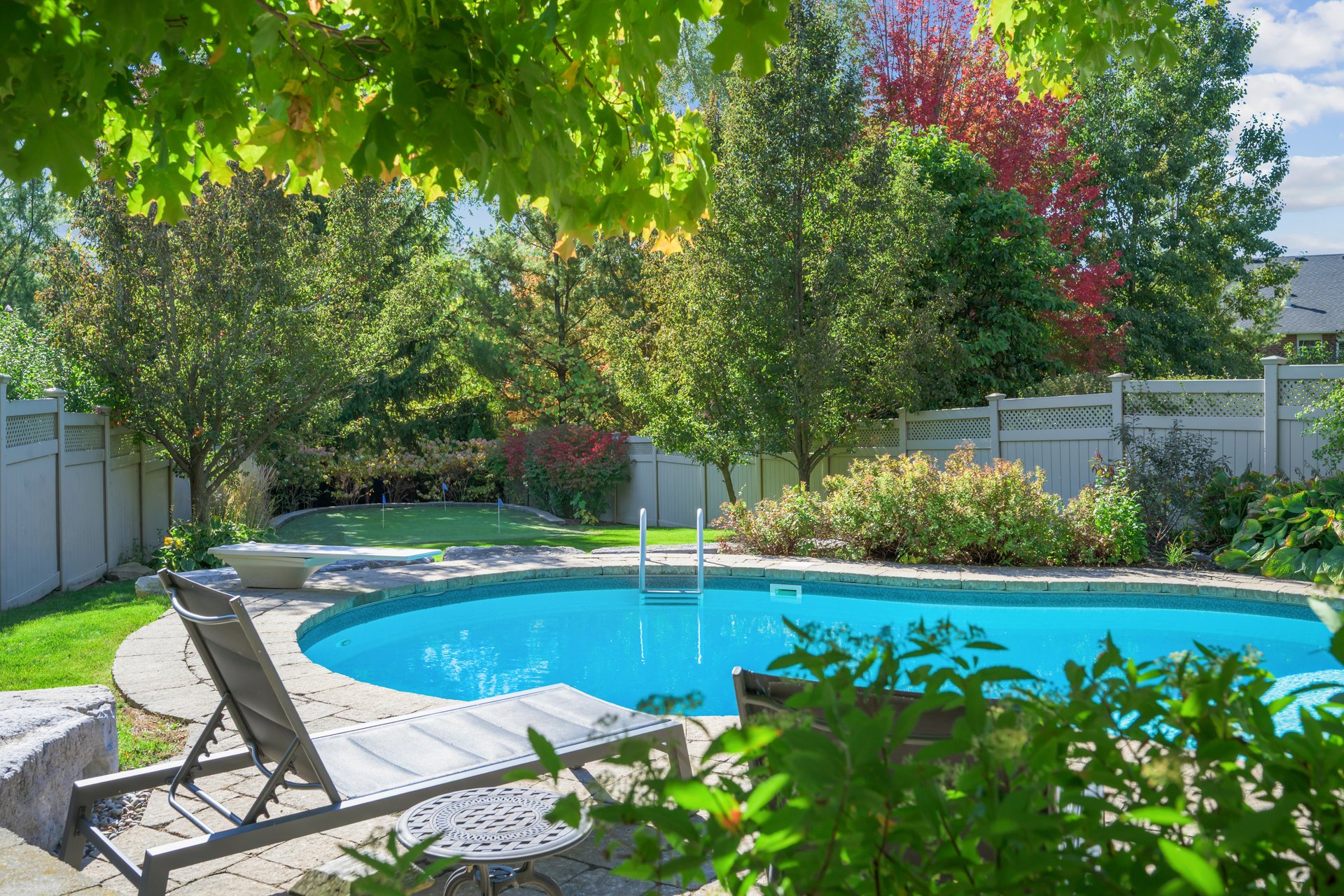 Resort-style yard backing onto lush ravine