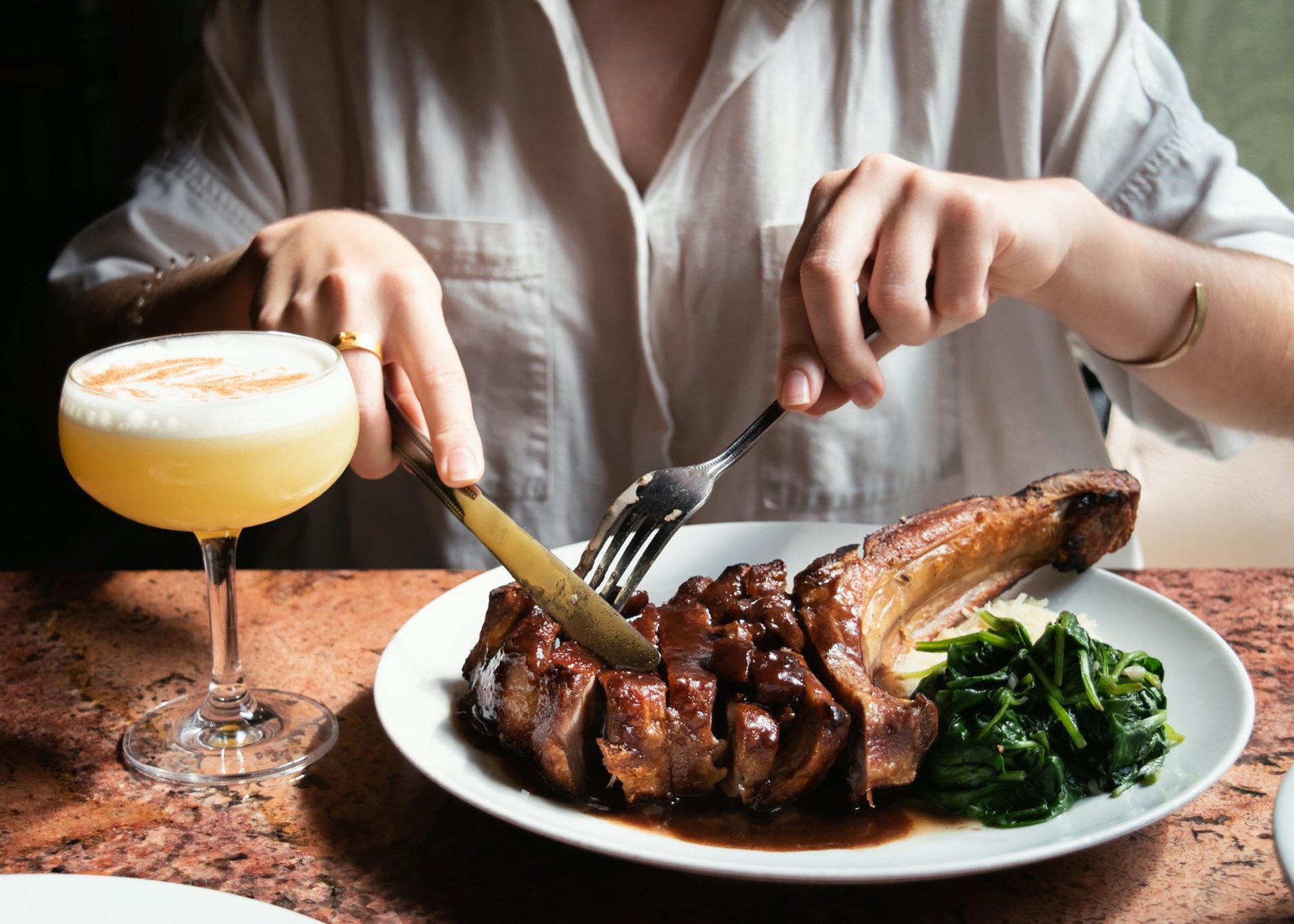 People toasting with wine glasses