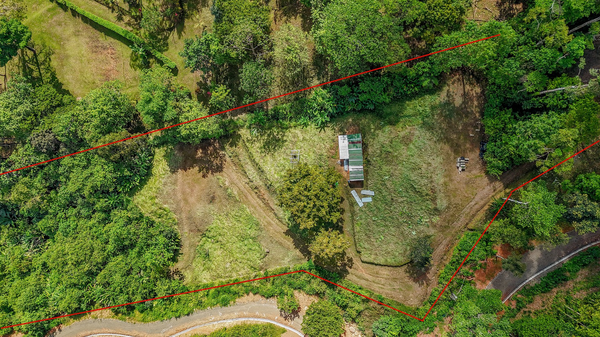 Jungle, Mountain & Valley View Lot with Two Large Plantels, Bordering a Crystal Mountain River with Swimholes & a Waterfall