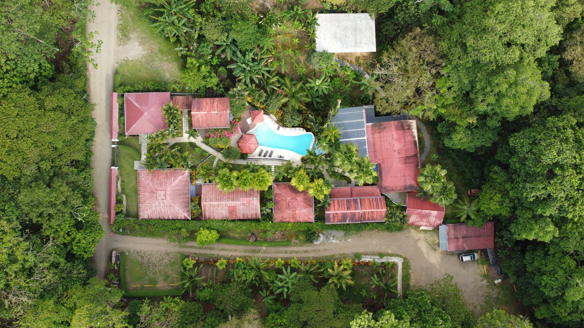 2.86 ACRES – Riverside Retreat with 6 Villas, Owner Suite, Saltwater Pool & Yoga Deck!!!