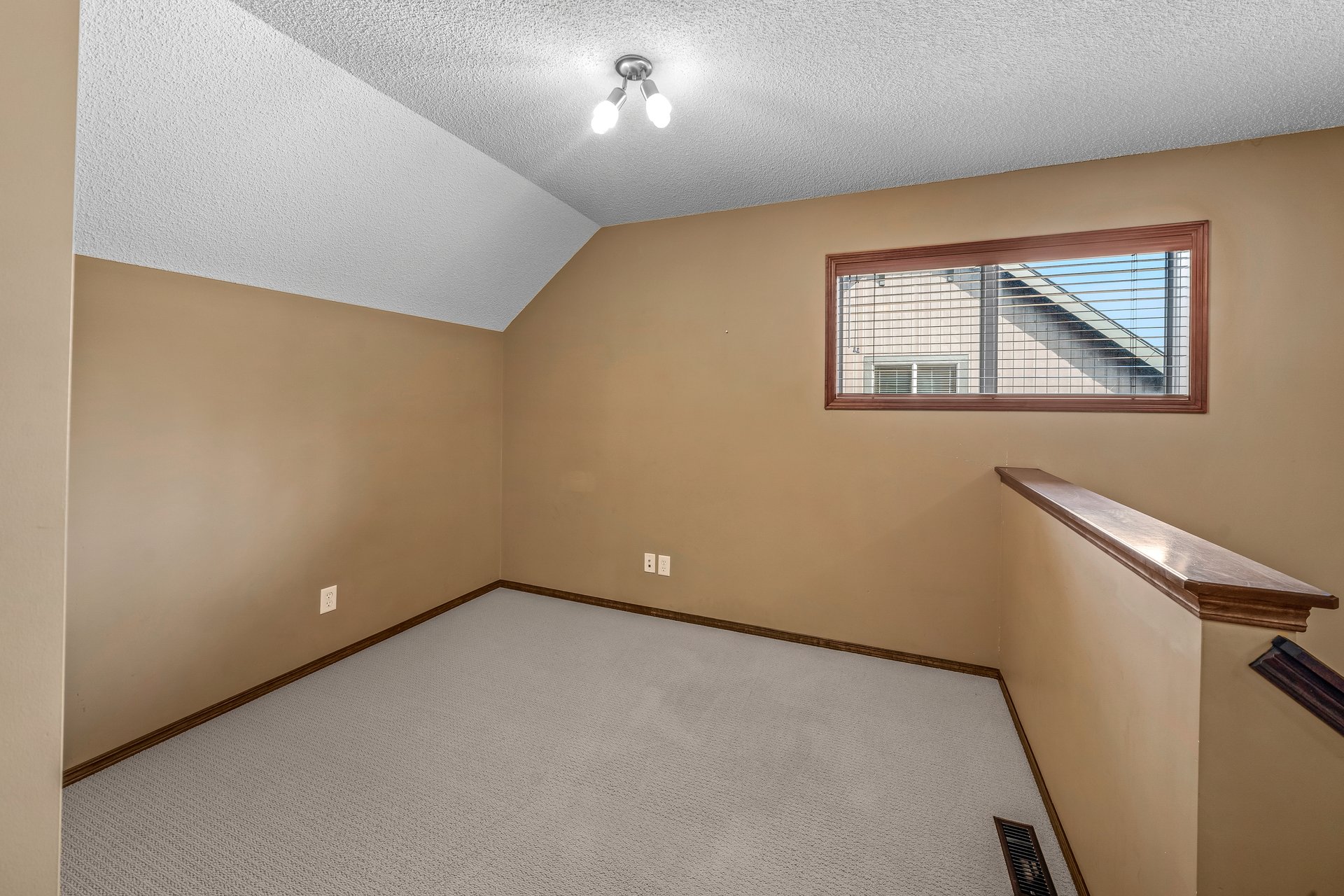 Detached Home in Three Sisters | Bareland Condo