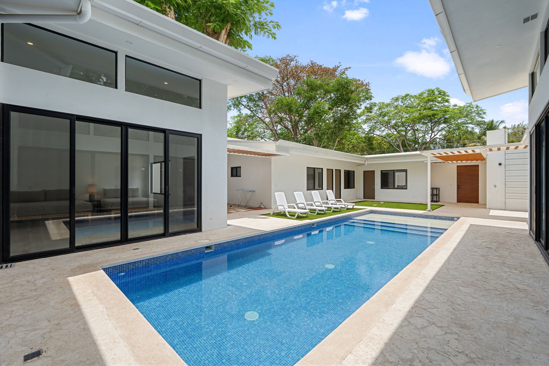 Castillo Blanco | Modern 4 Bedroom Home with Saltwater Pool – Walk to the Beach + Seller Financing Available