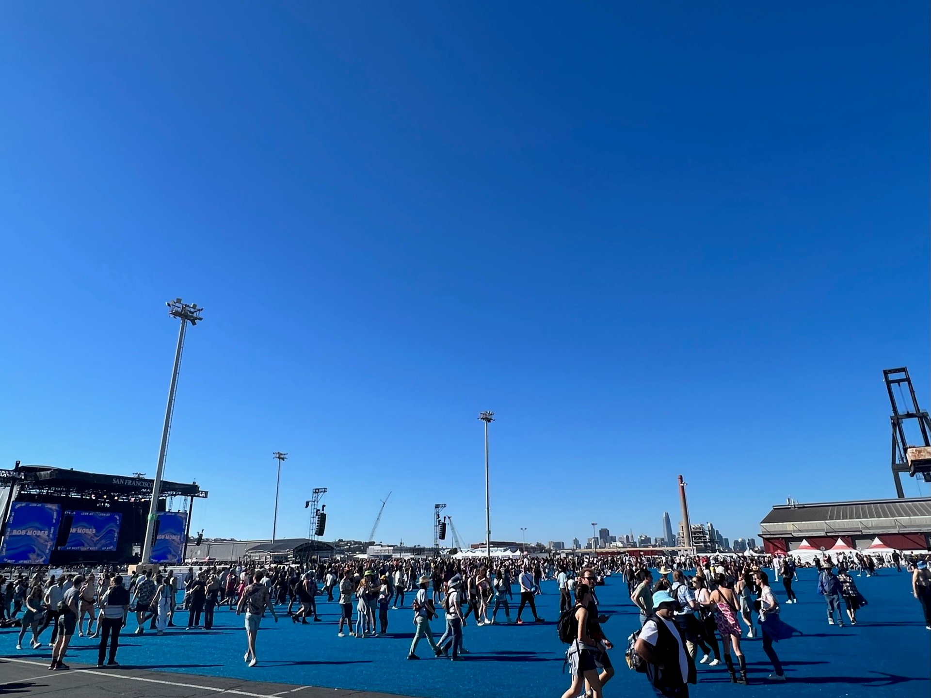 Attendees gathered for an outdoor music festival at San Francisco Pier 80