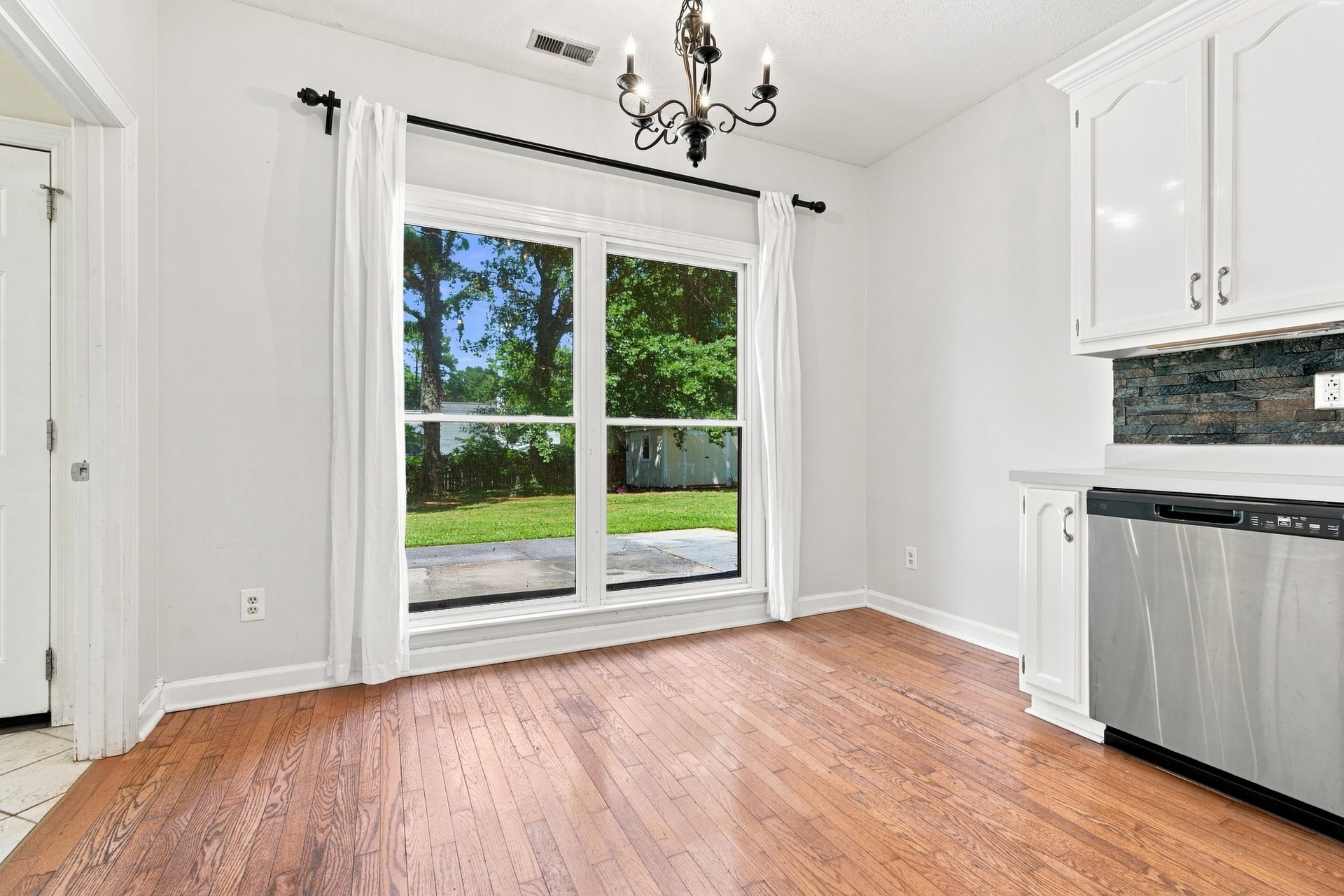 Full-Brick Beauty with Spacious Corner Lot & Private Fenced Backyard