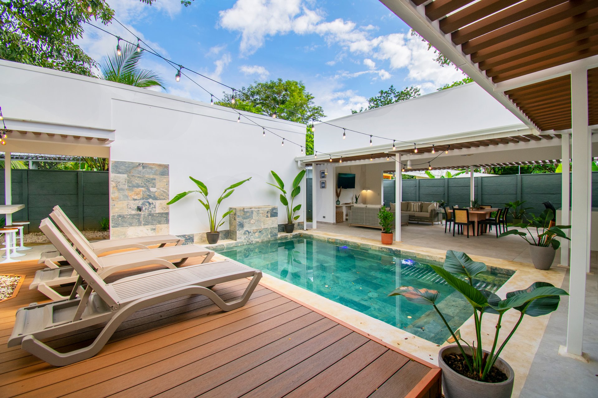 Turnkey Tropical Home Steps from the Beach