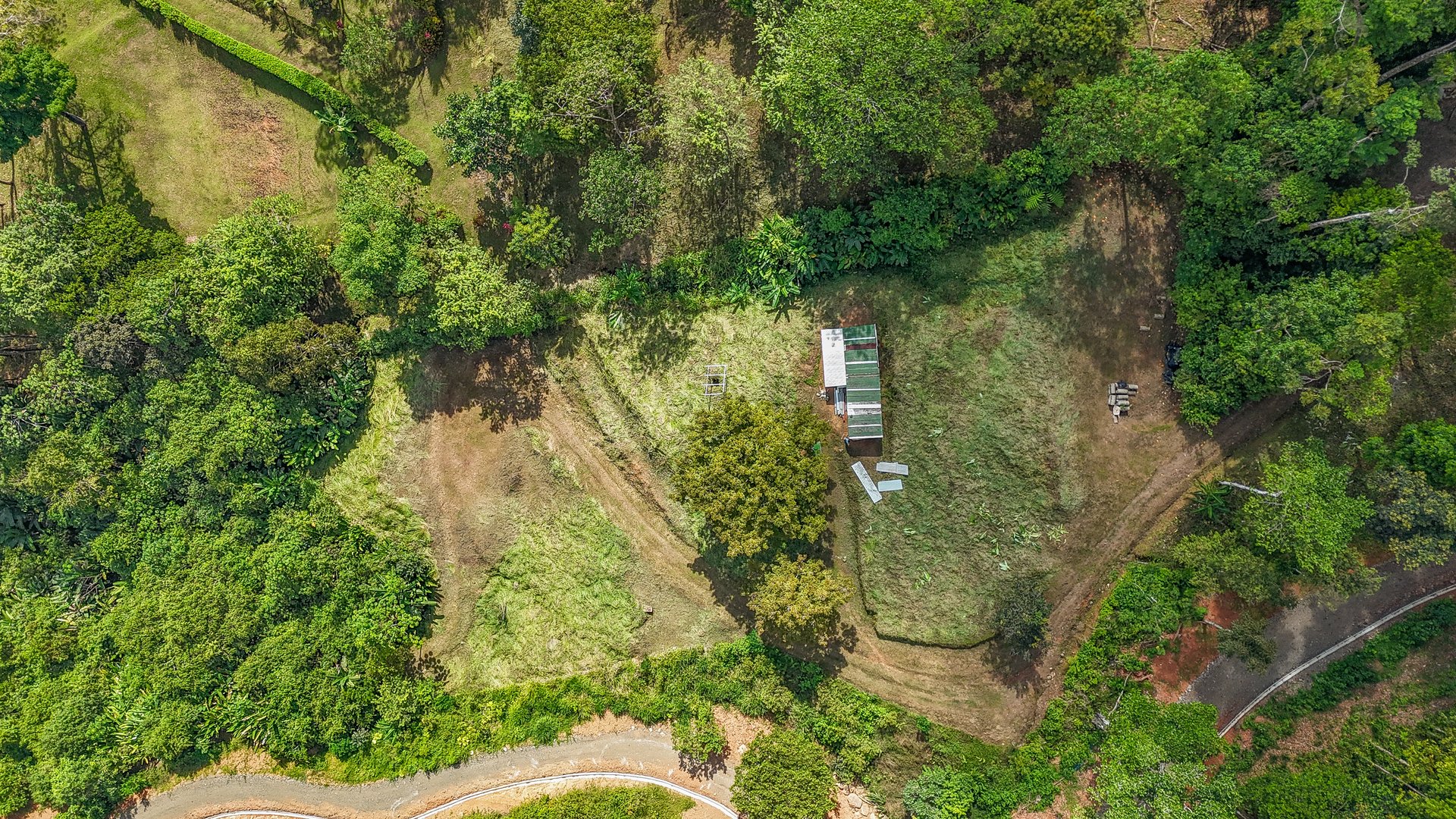 Jungle, Mountain & Valley View Lot with Two Large Plantels, Bordering a Crystal Mountain River with Swimholes & a Waterfall