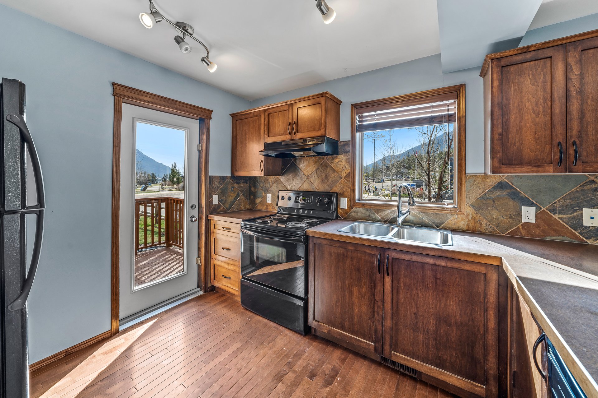 Detached Home in Three Sisters | Bareland Condo