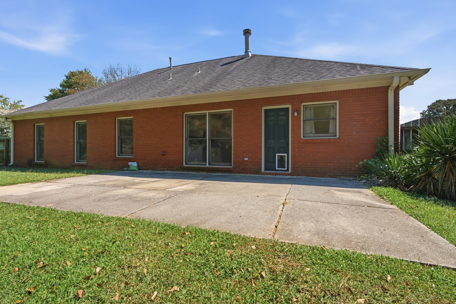 Full-Brick Beauty with Spacious Corner Lot & Private Fenced Backyard