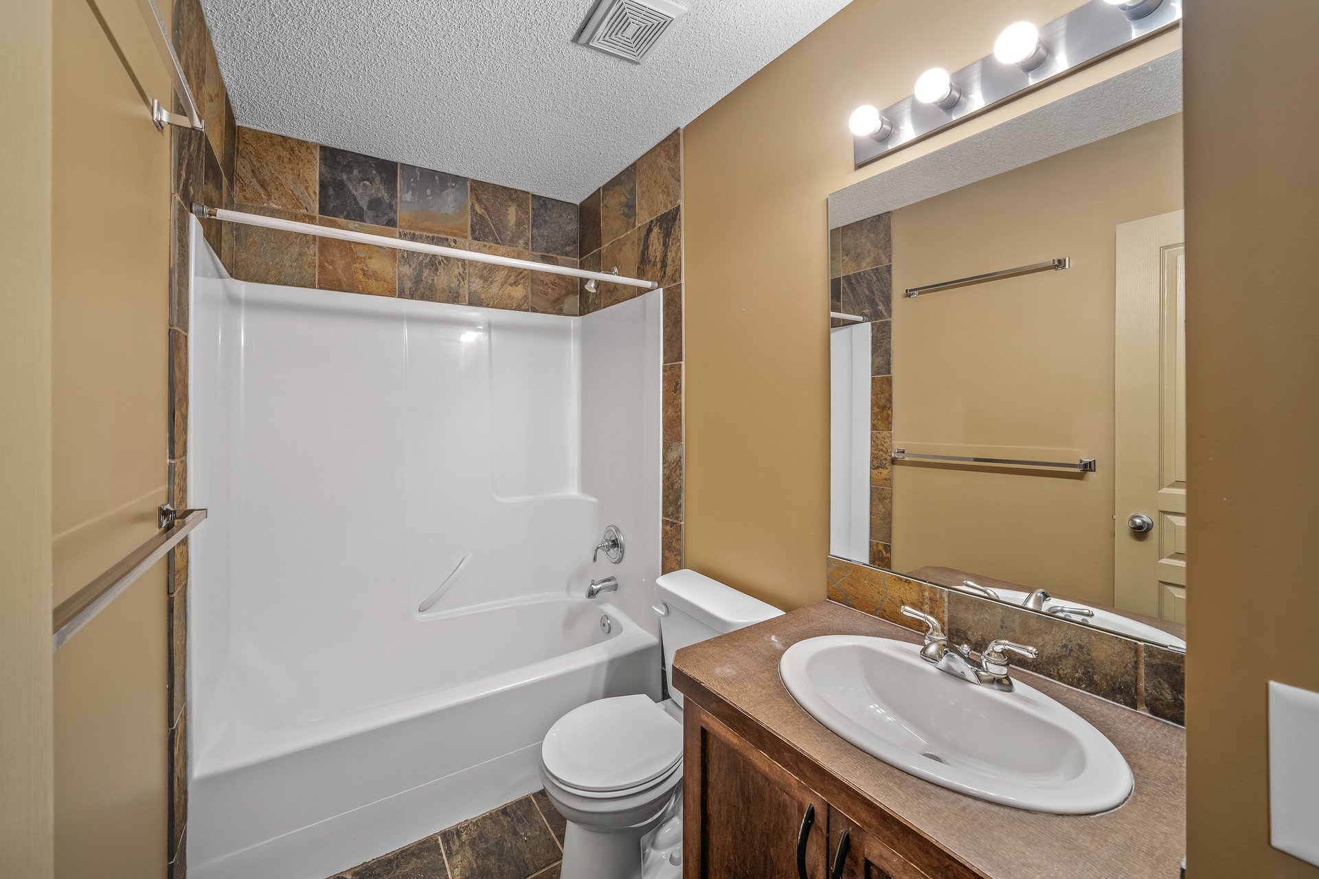 Detached Home in Three Sisters | Bareland Condo