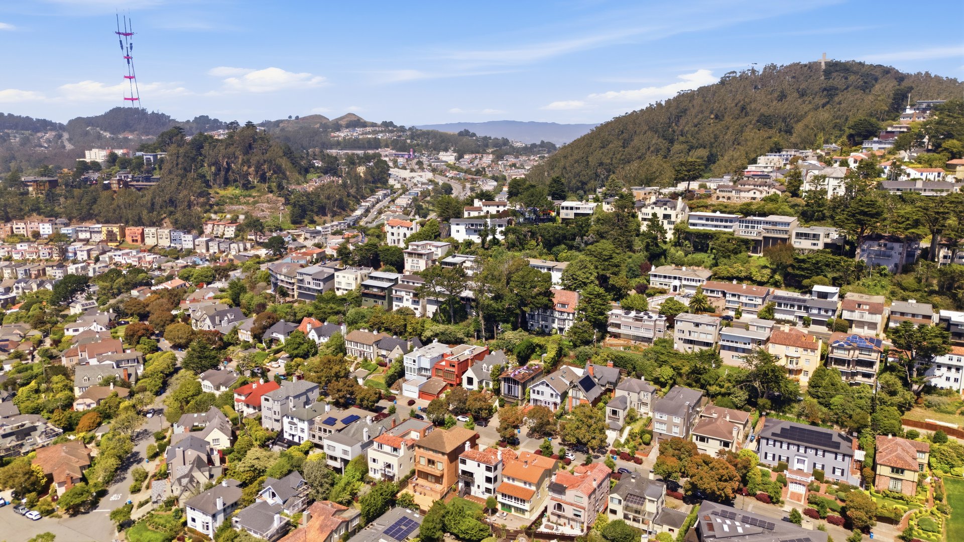 Aerial view of San Francisco homes with varied architecture and hillside settings