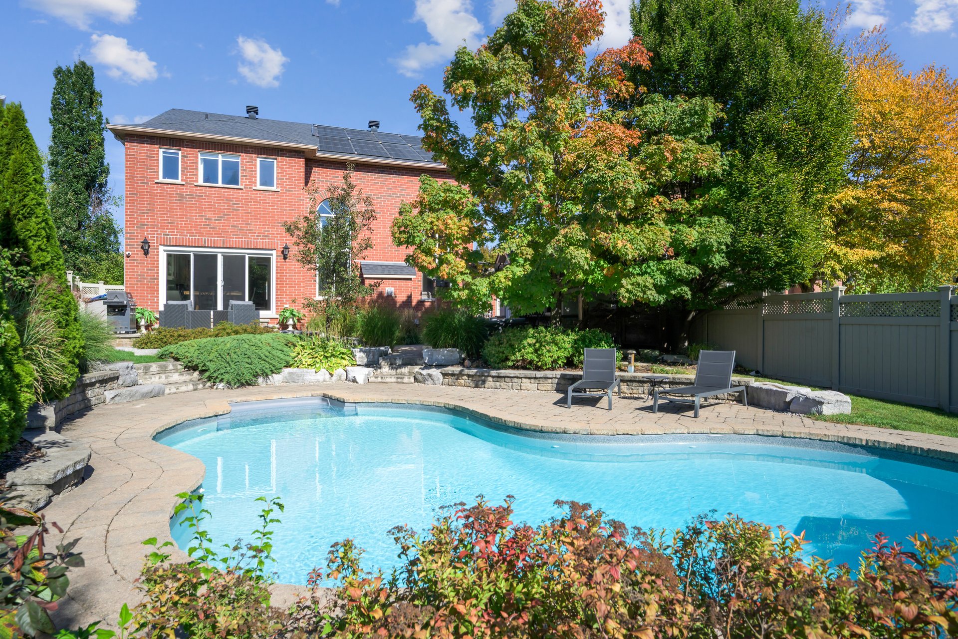 Resort-style yard backing onto lush ravine