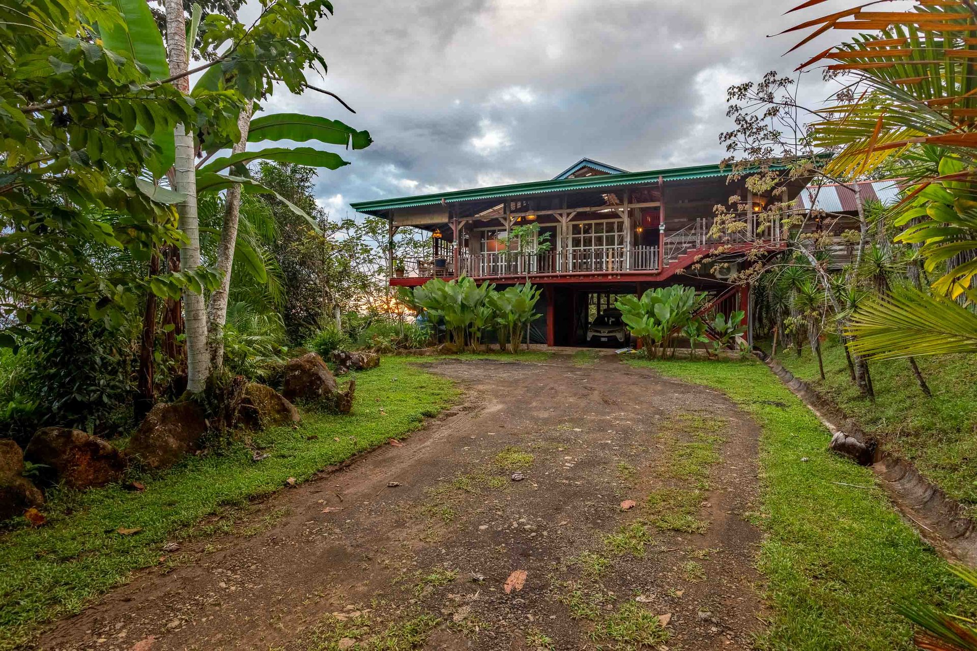 A Handcrafted Residence Immersed in Nature Above the Canopy Ocean View Architectural Home