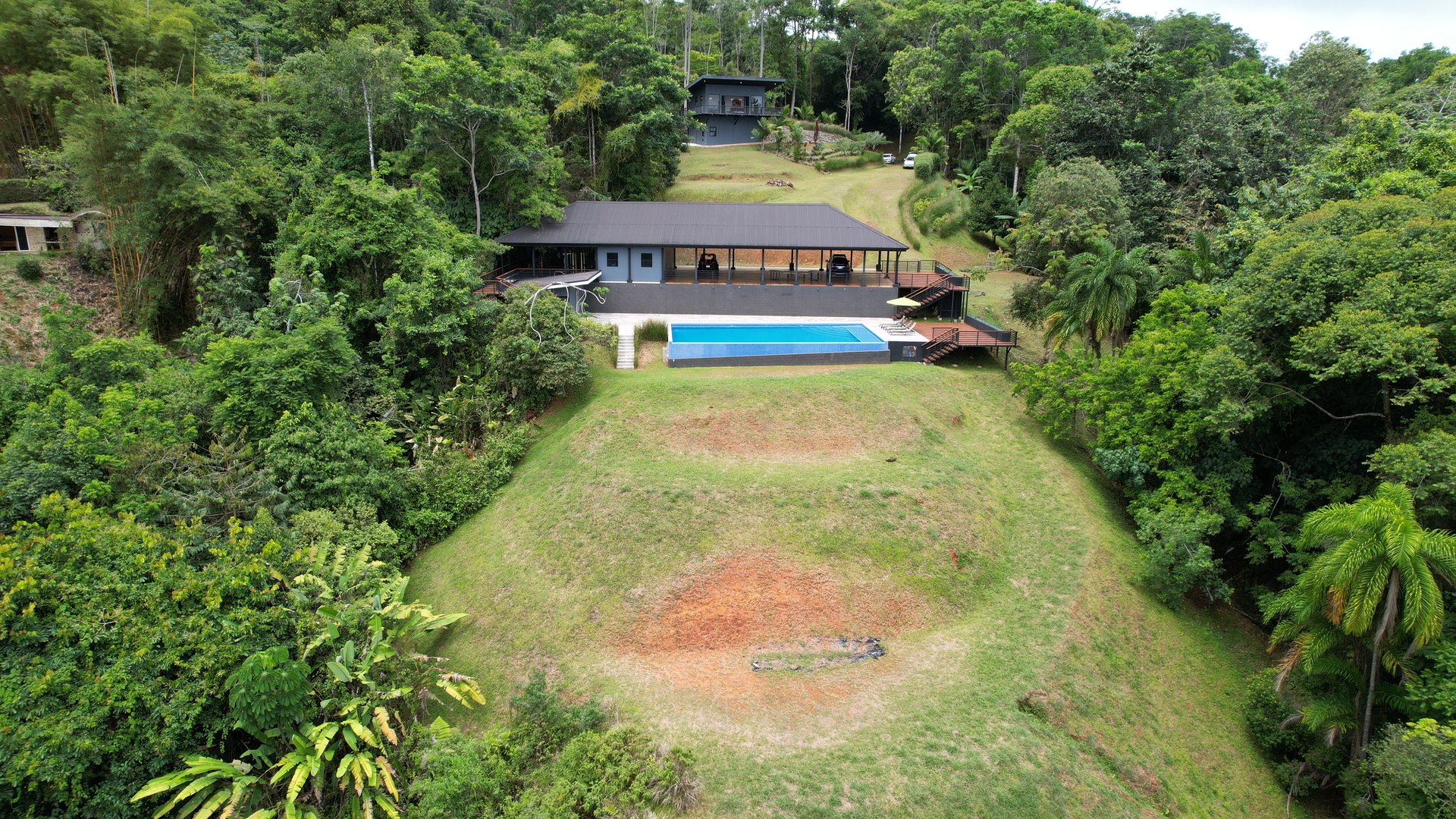 Mountain Estate with Waterfall View & Partial Ocean View, Commercial Kitchen, Gym, Massive Saltwater Pool & 4 Building Sites