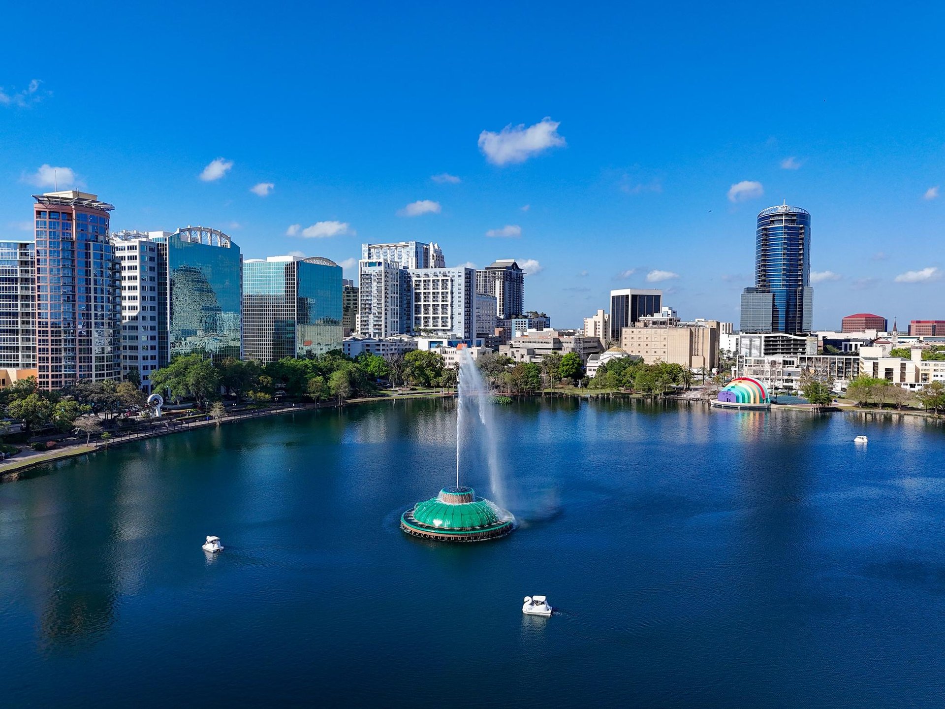 Orlando skyline and Lake Eola fountain in downtown Orlando during spring.