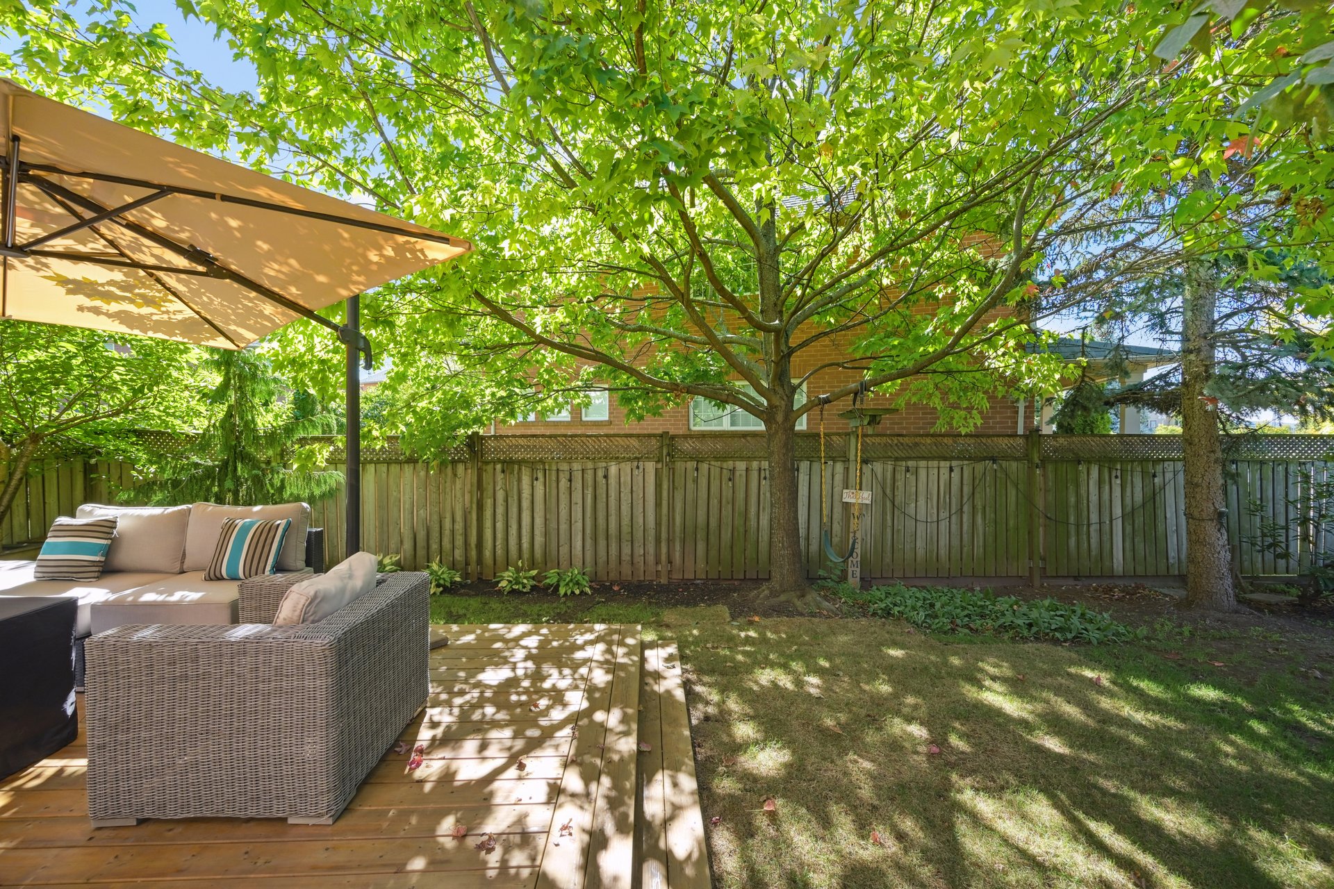 Sun-Filled Sophistication on a Rare Pie-Shaped Lot in West Oak Trails