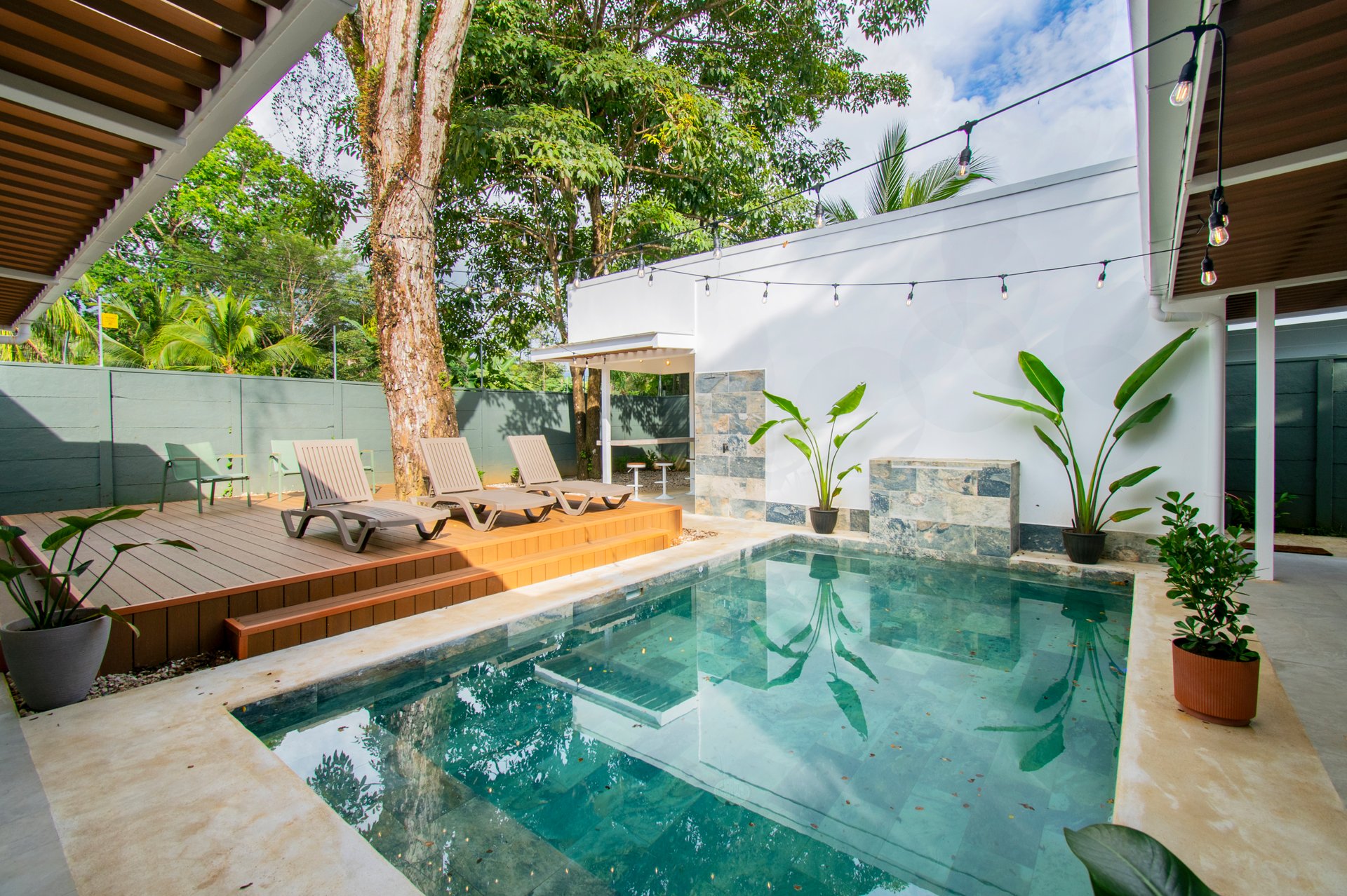 Turnkey Tropical Home Steps from the Beach