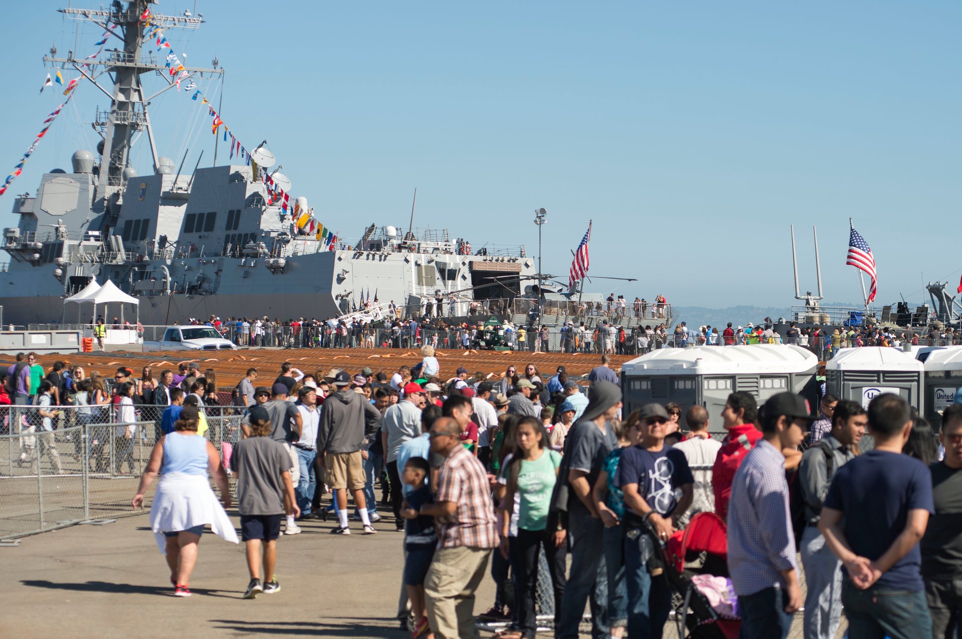 Visitors lining up for Navy and Coast Guard ship tours at Fleet Week