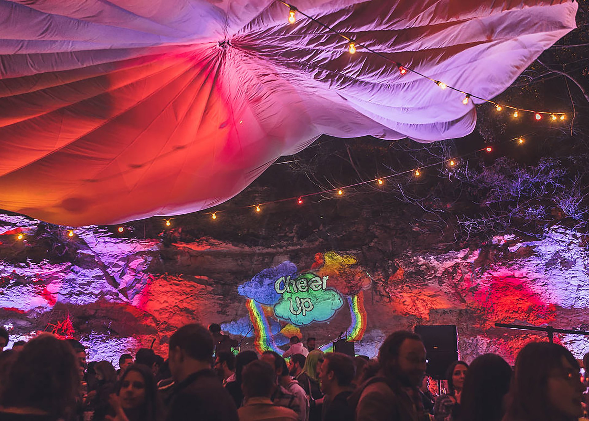 People toasting with wine glasses