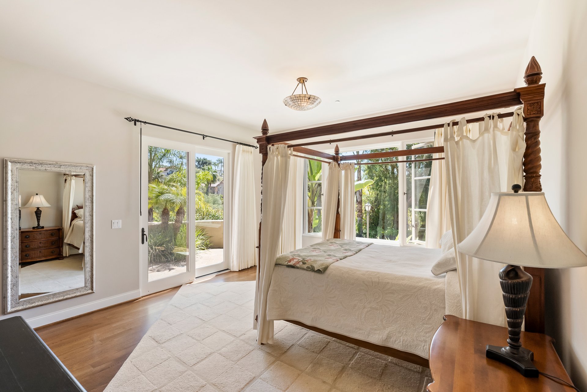 rimary bedroom suite at 16733 Calle Hermosa with garden views
