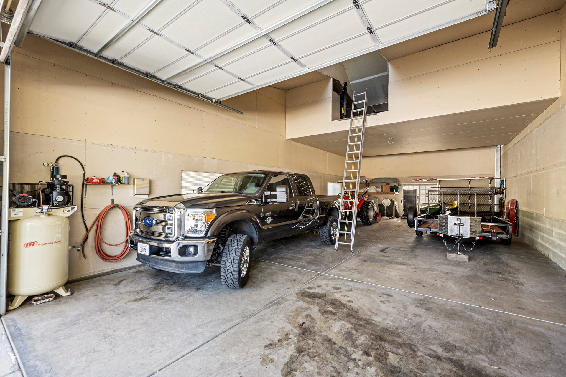 Custom Built Home on 4 Flat Acres in the Heart of Pleasant Valley – A Car Enthusiast's Dream!