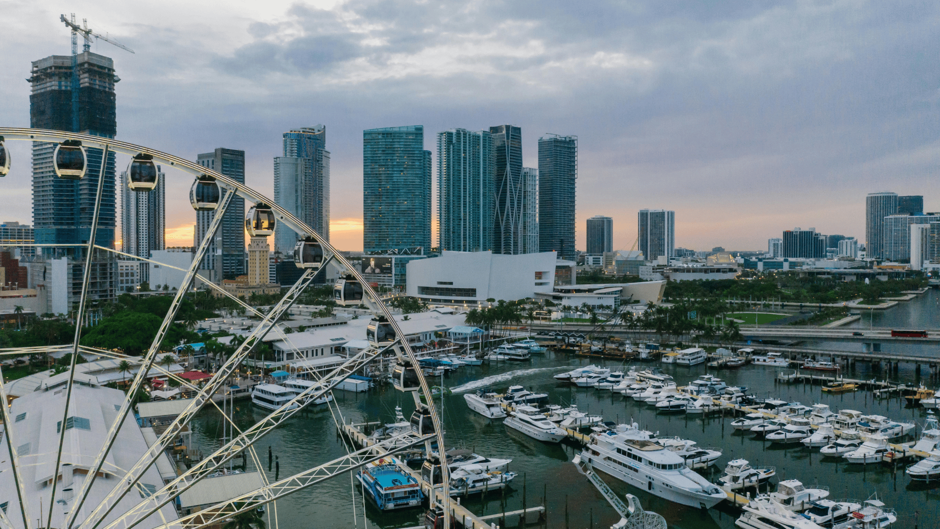 NYC waterfront skyline with luxury yacht marina and high-rise condominiums from elevated view
