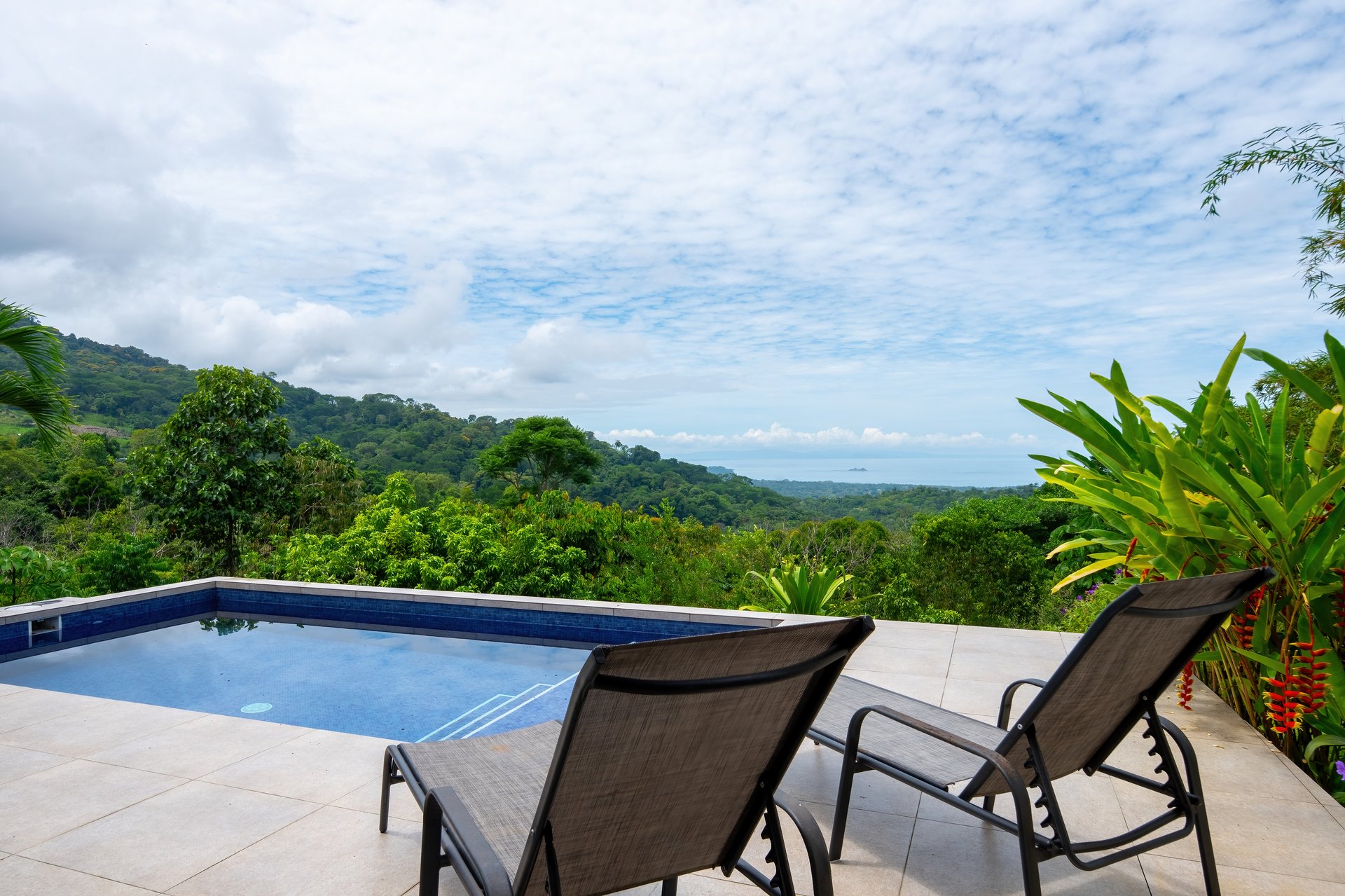 6.45 ACRES – 3 Bedroom Luxury Ocean View Home Surrounded By Vibrant Rainforest And Wildlife!!!