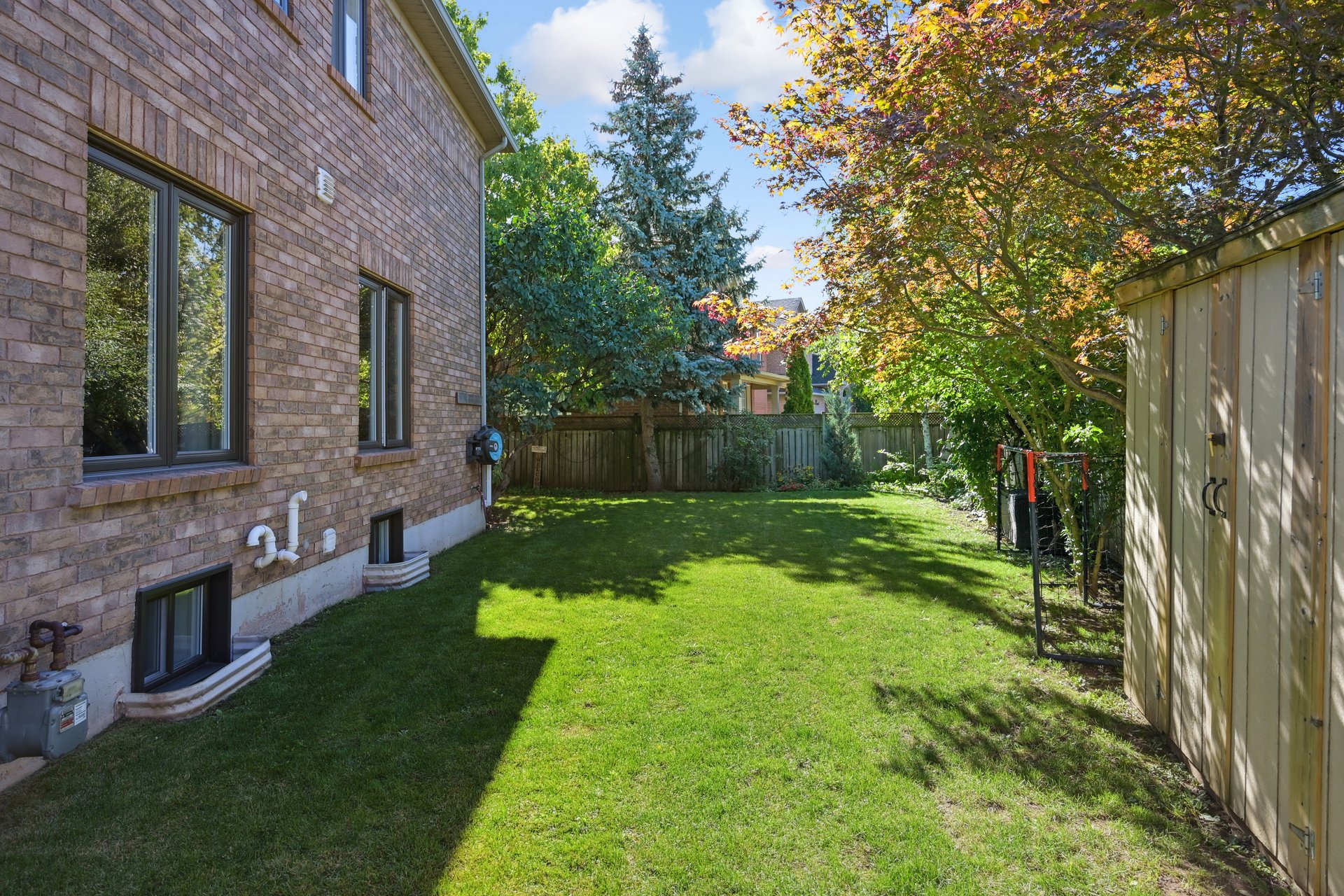 Sun-Filled Sophistication on a Rare Pie-Shaped Lot in West Oak Trails