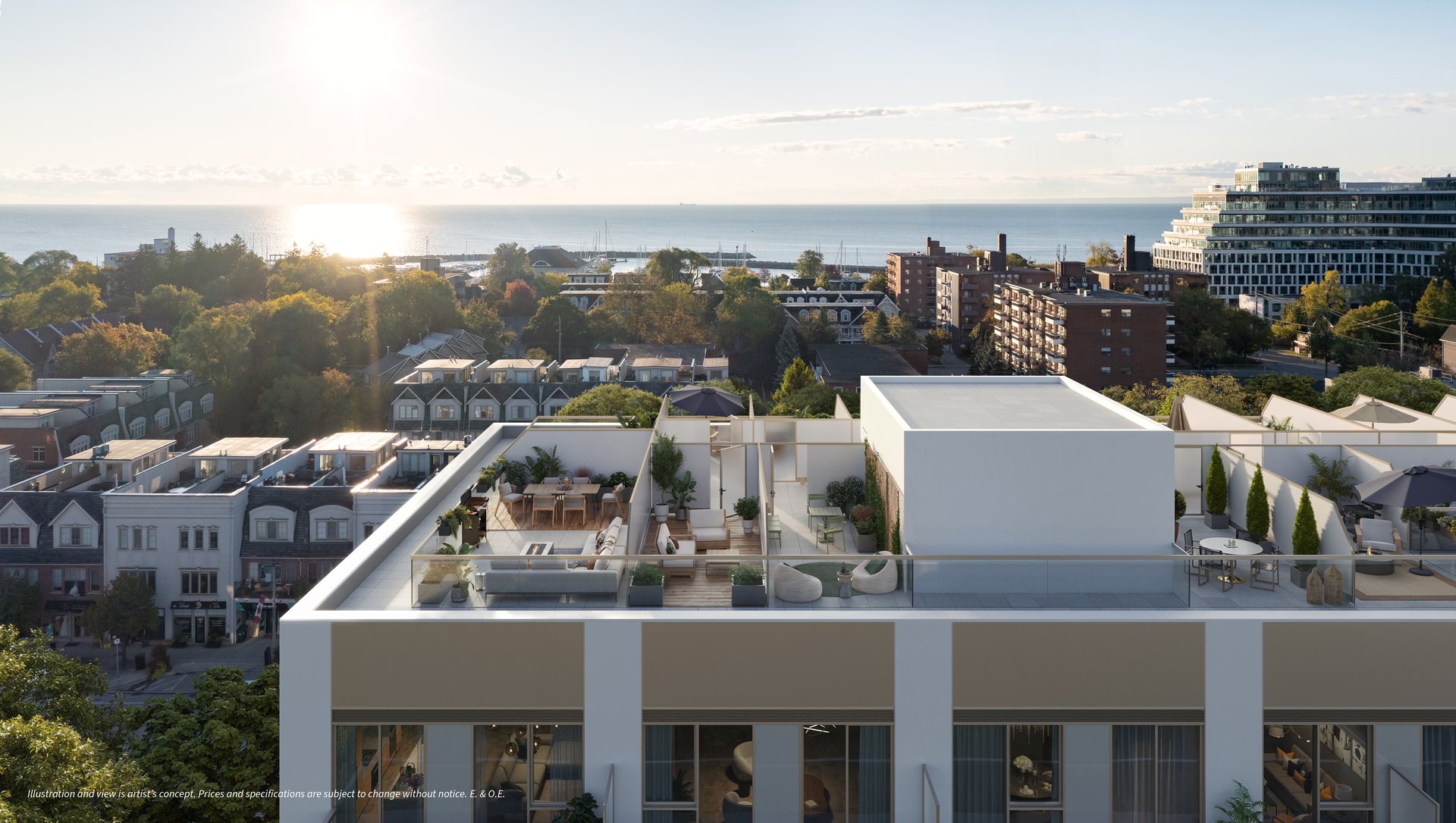 Condo rooftop terrace with lounge seating and planters overlooks Bronte Village and Lake Ontario at sunset.