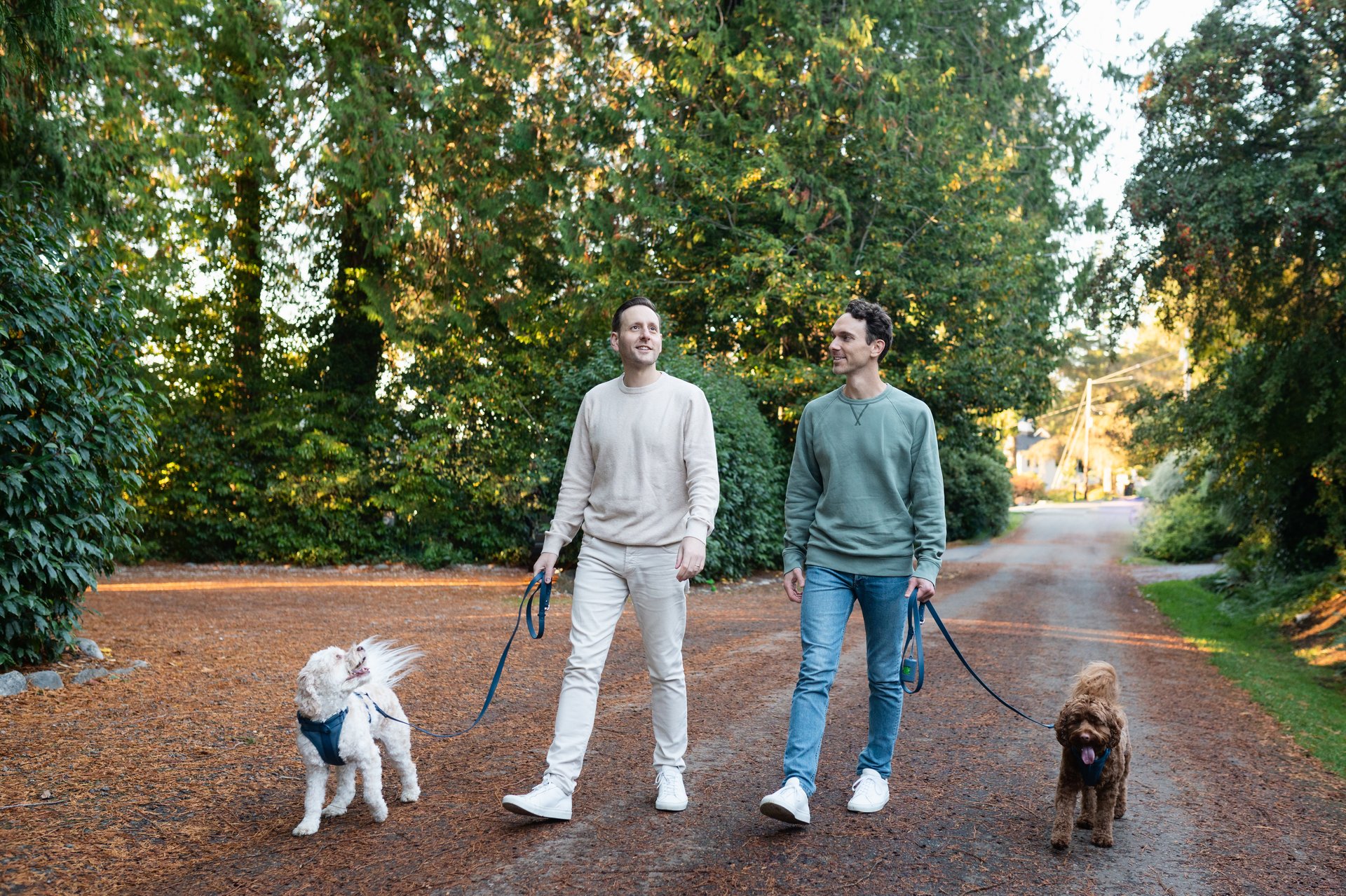 Jake Aspinwall and Joe Wiggins walking their dogs in Port Madison, Bainbridge Island, WA