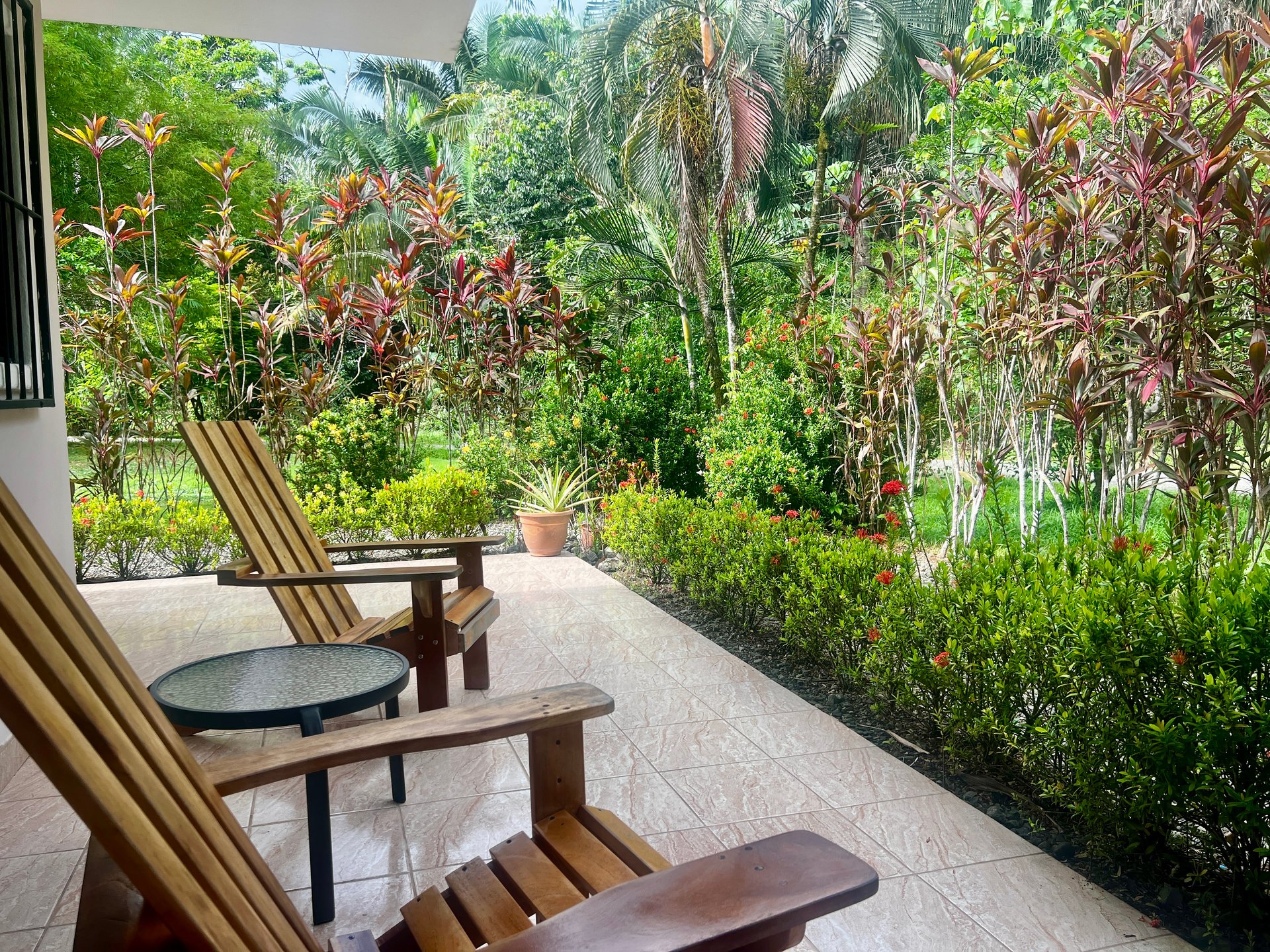 Remodeled Beach-Style Villa with Lush Jungle Setting