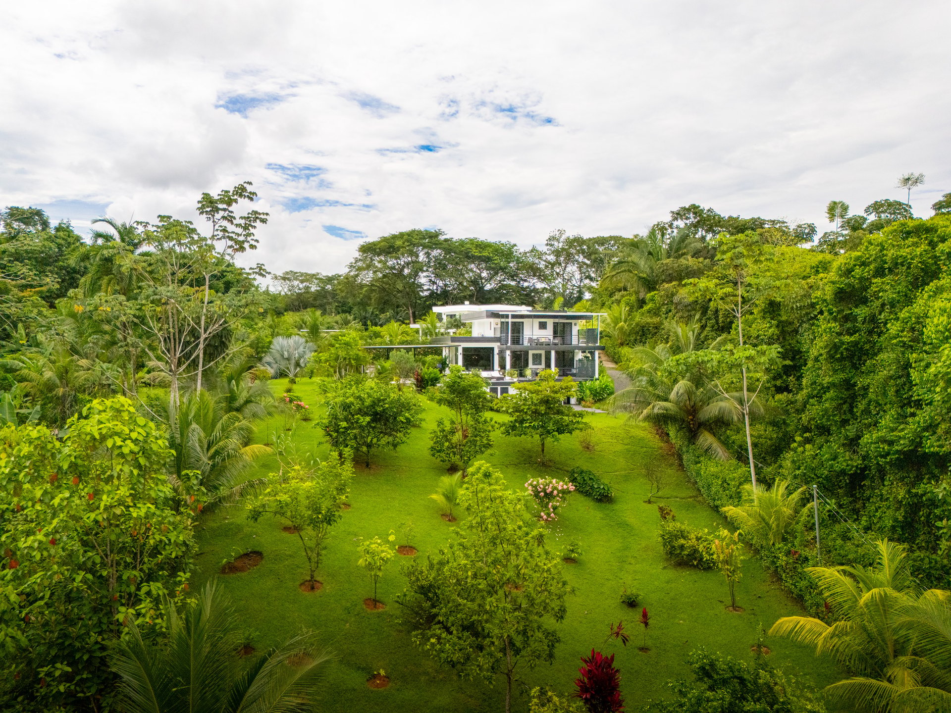 Modern 4-Bedroom Family Sanctuary with Infinity Pool, Edible Forest Garden - Exclusive Gated Ojochal Community 